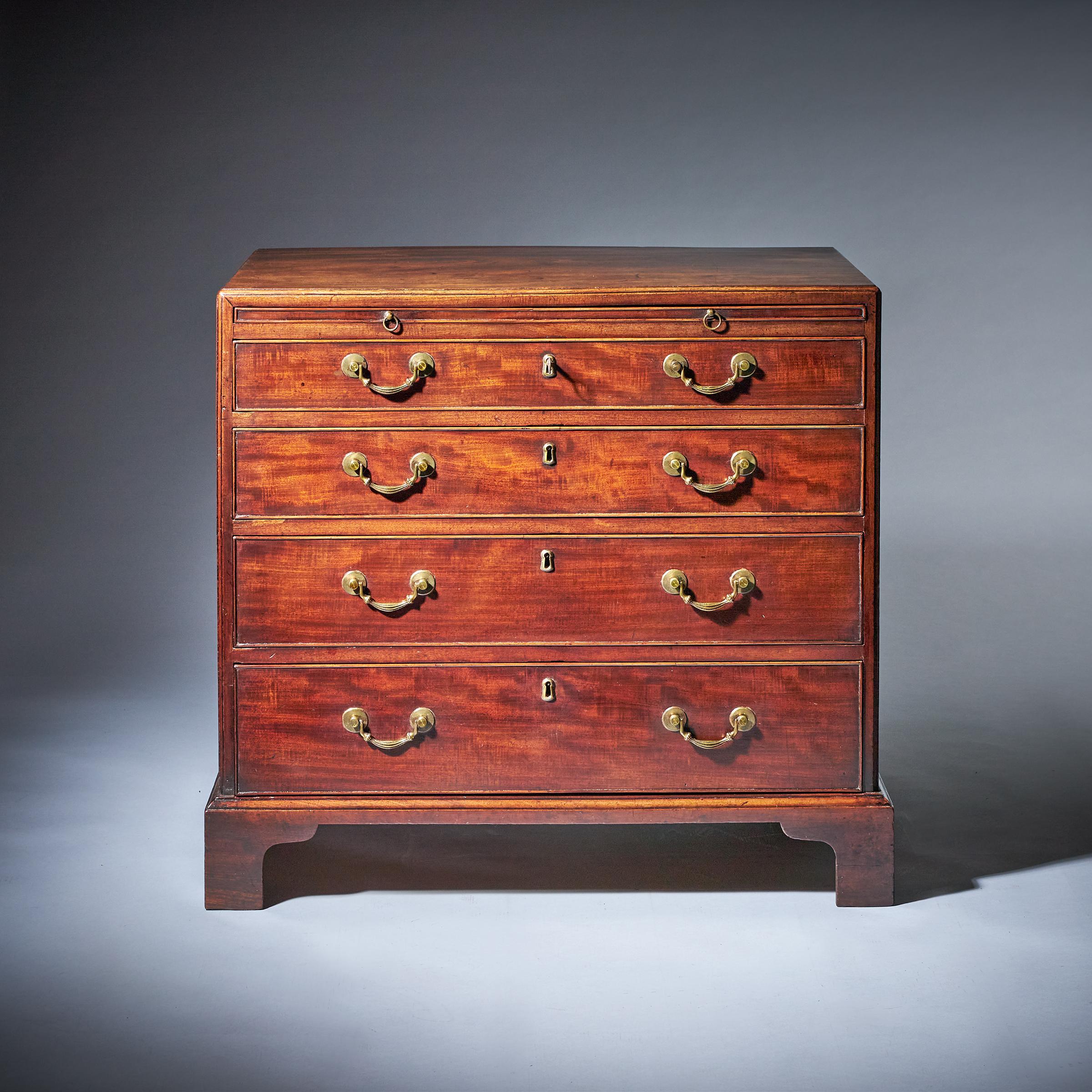 A fine and original 18th-century George II figured mahogany caddy-topped Bachelors chest with brushing slide, Circa 1740. 

Attributed to Giles Grendey

The chest is 'caddy' moulded to the styles and top above a brushing slide over four long