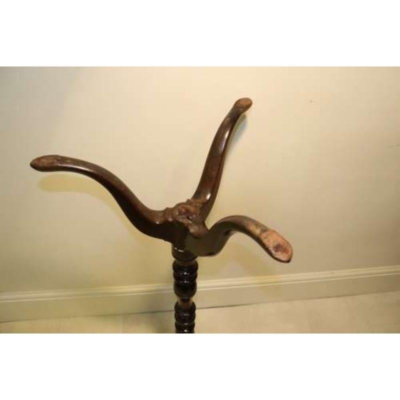 A Rare Early Georgian Mahogany Tripod Candle Stand

This fine piece of early English furniture dates to the mid-19th century, George II period. It is made from rich dense Cuban mahogany and has a wonderful original color and patination. The