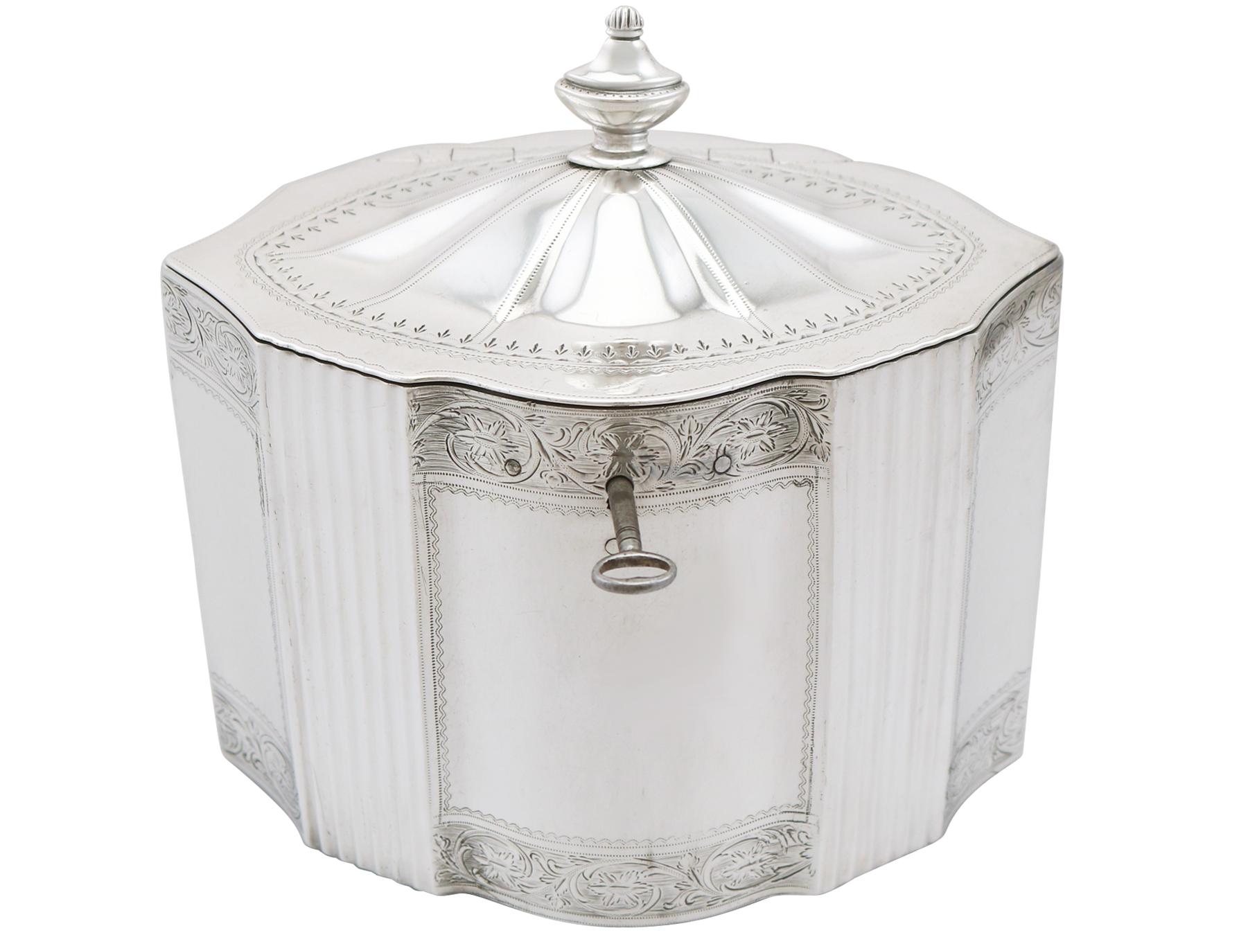 An exceptional, fine and impressive antique Georgian English sterling silver locking tea caddy; an addition to our silver teaware collection.

This exceptional antique George III sterling silver locking tea caddy has a navette, paneled shaped
