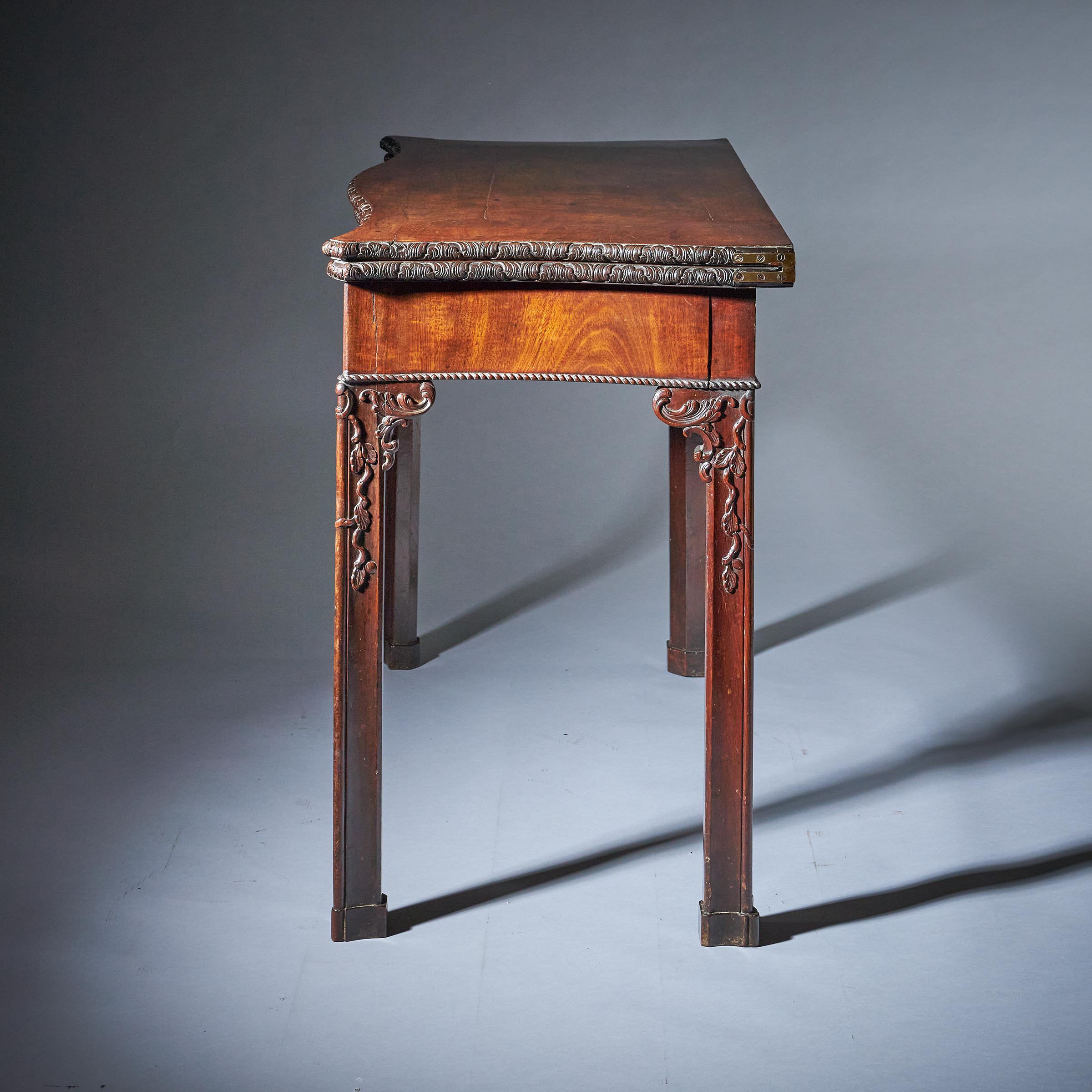 English 18th Century George III Carved Mahogany Serpentine Concertina Action Card Table For Sale