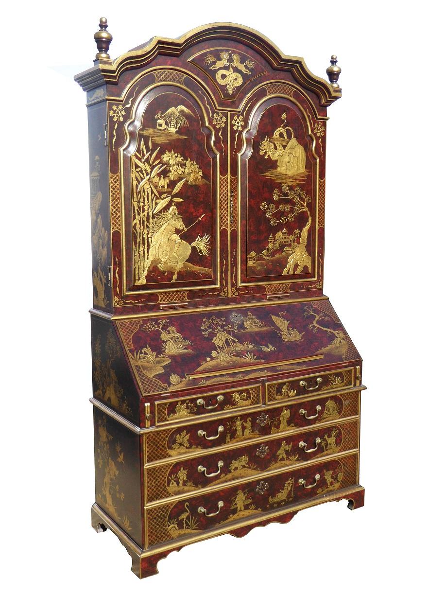 For sale is a large 18th century and later chinoiserie Bureau bookcase. The top of the bureau has two decorated and paneled doors opening to reveal a fully fitted interior containing various drawers and pigeon holes above two candle slides. Below