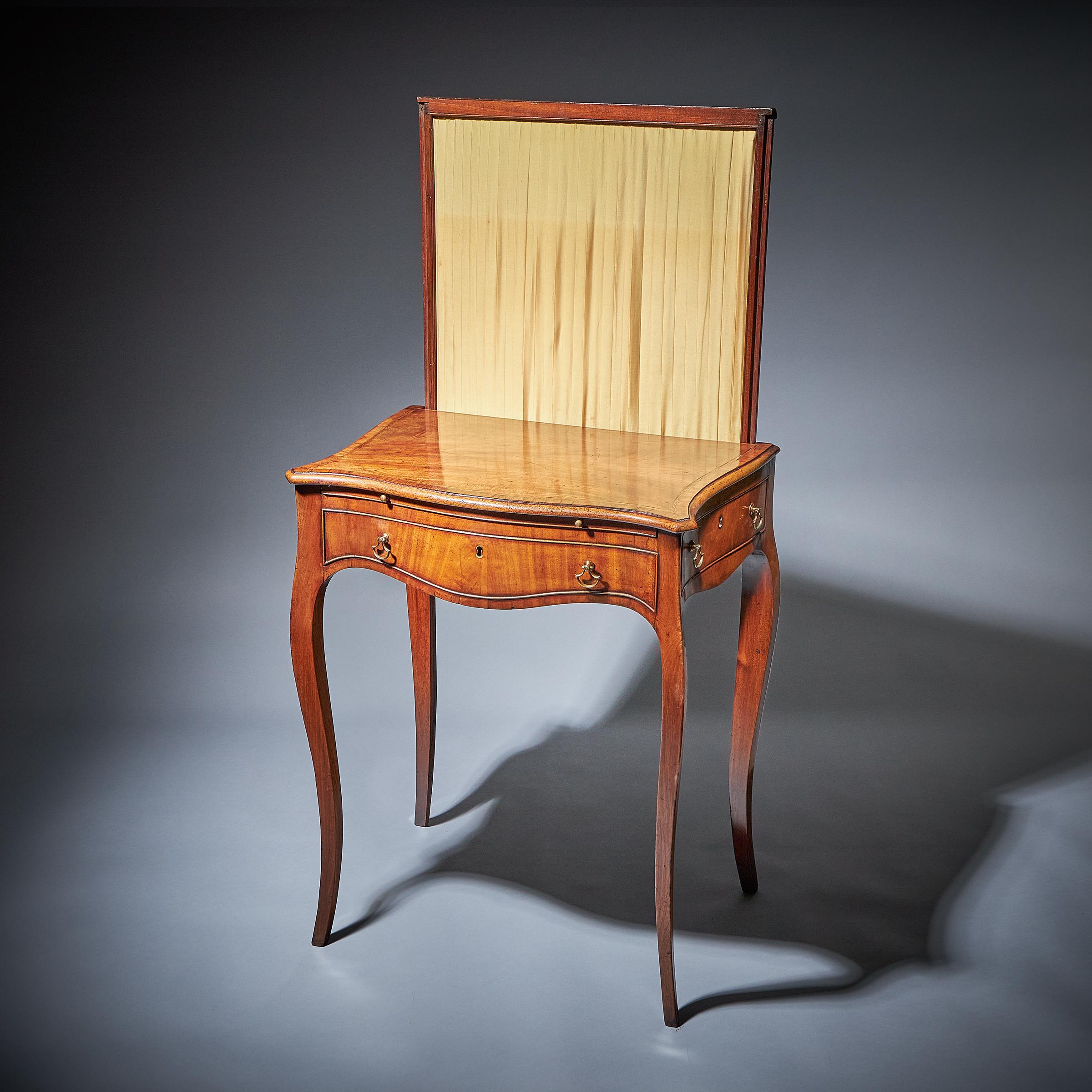 A fine and rare mahogany serpentine writing table in the manner of Thomas Chippendale with retractable firescreeen, writing slide inset with tooled leather and drawer to one side bearing the label for M.Harris and Sons. 

The serpentine ovolo