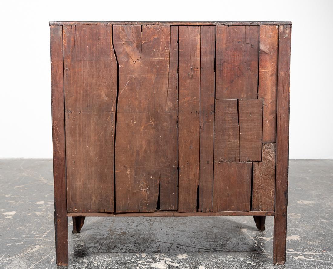 A well constructed George III period mahogany bow front chest of drawers above three graduated drawers with brass ring pulls. Drawers lines with cock beading. Resting above sweeping bracket feet. One key is present.

English, circa 1780-1810.