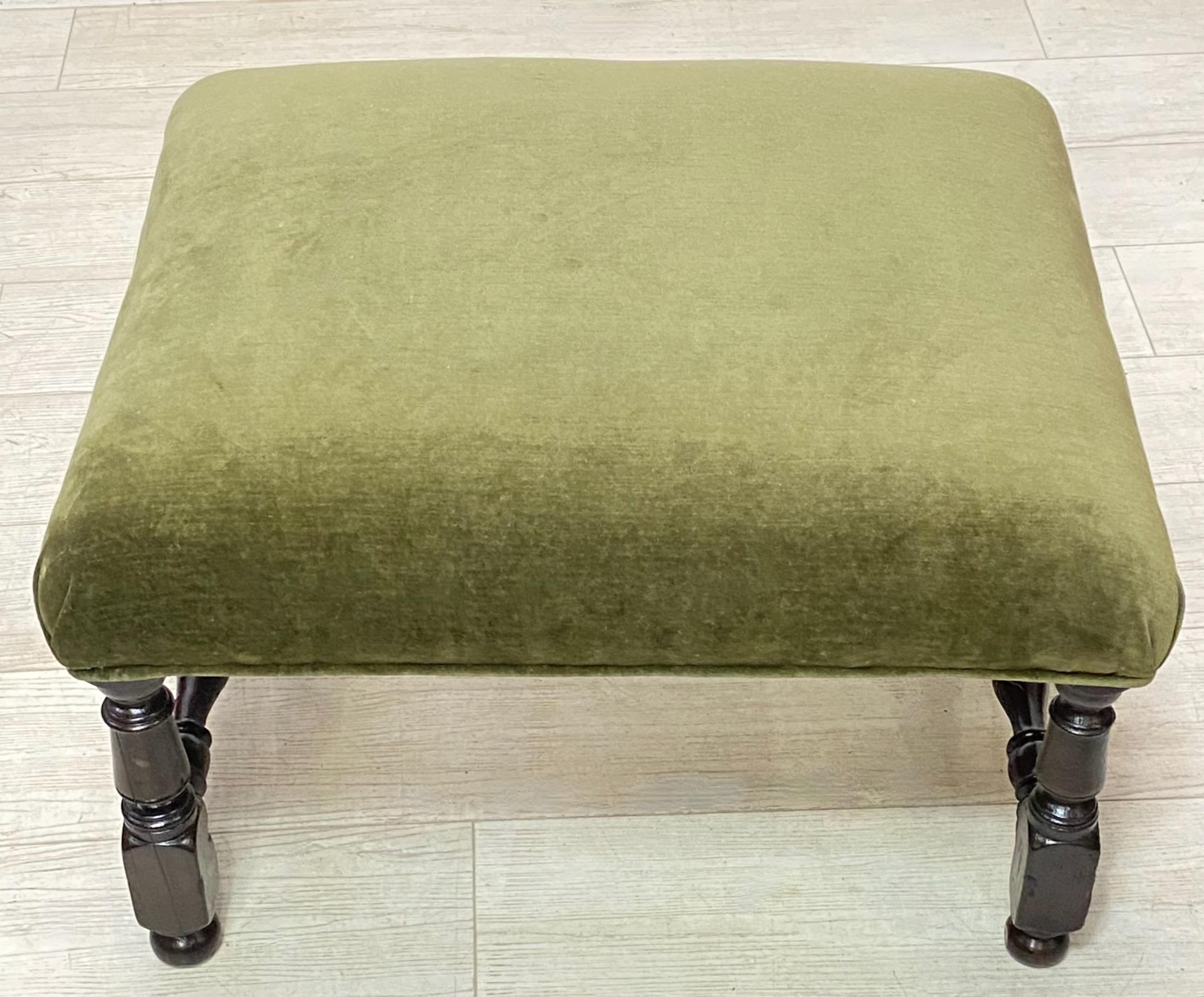 Traditional George III period oak foot stool with new velvet upholstery.
Having some old repairs but solid and sturdy. 
In very good antique condition.
England, late 18th century, circa 1790.