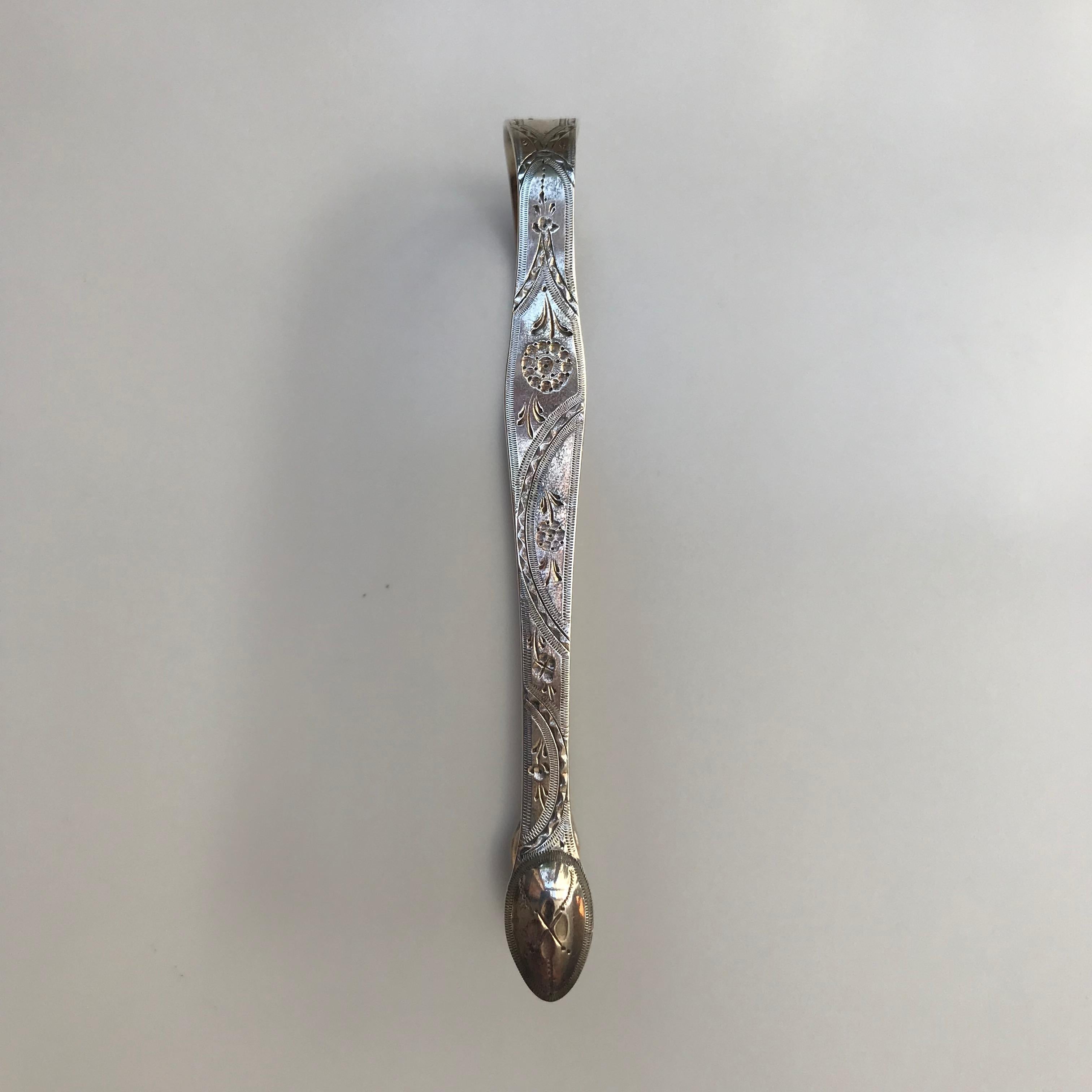 18th century, George III sterling silver sugar tong by Hester Bateman; London, circa 1784-1785, 1.03 ozt.