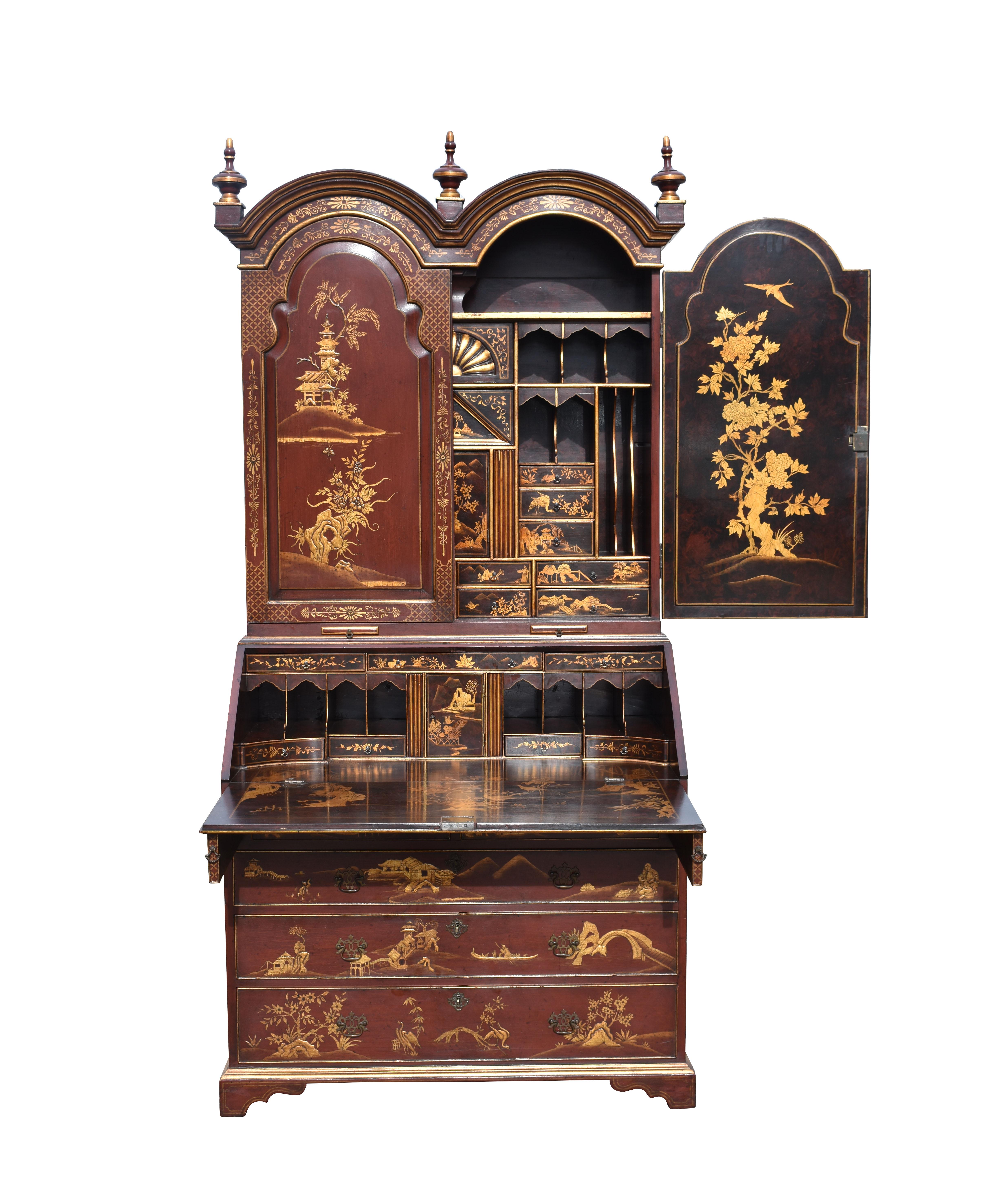 For sale is a good quality George III chinoiserie secretary bookcase. Having a double dome top above two paneled doors, opening to reveal a fully fitted interior comprising various pigeon holes, drawers and cupboards. Below this, the fall front