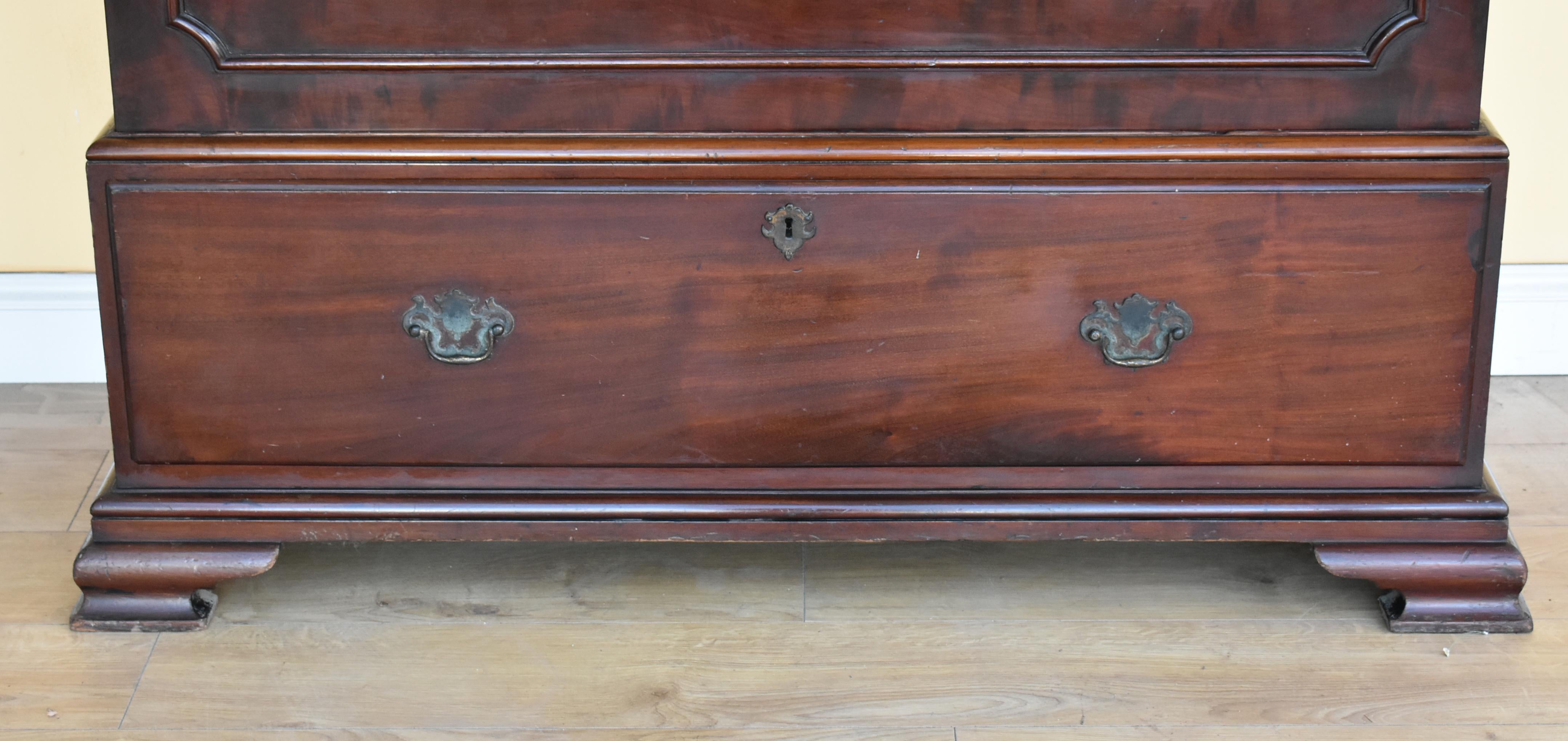 For sale is a good quality George III mahogany silver chest made by T. Wilson, great queen street of London. The top of the chest has a lift up lid which opens to reveal ample storage space within. The chest has a single drawer in the base and two