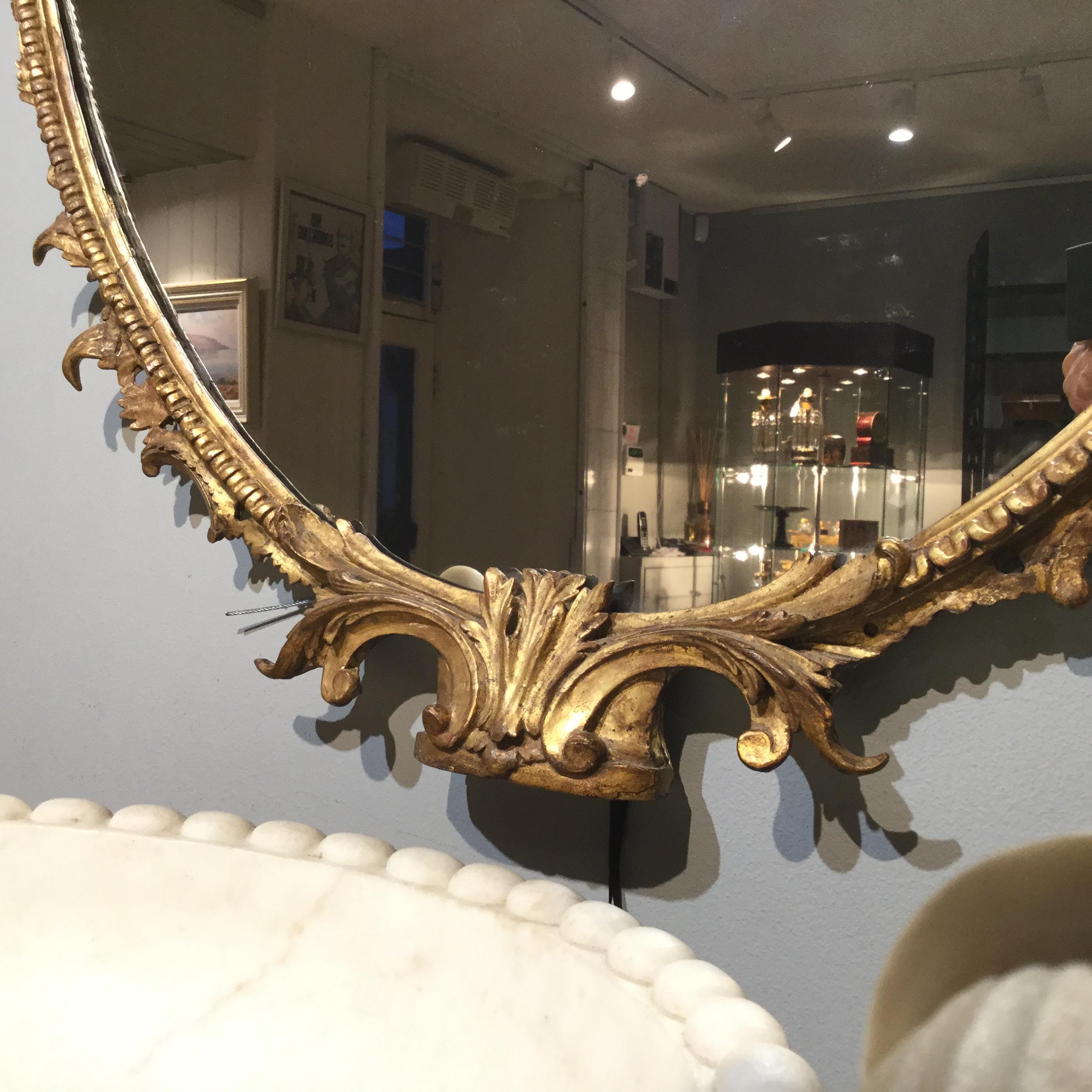 Late 18th Century 18th Century George III Period Carved Oval-Shaped Giltwood Mirror For Sale