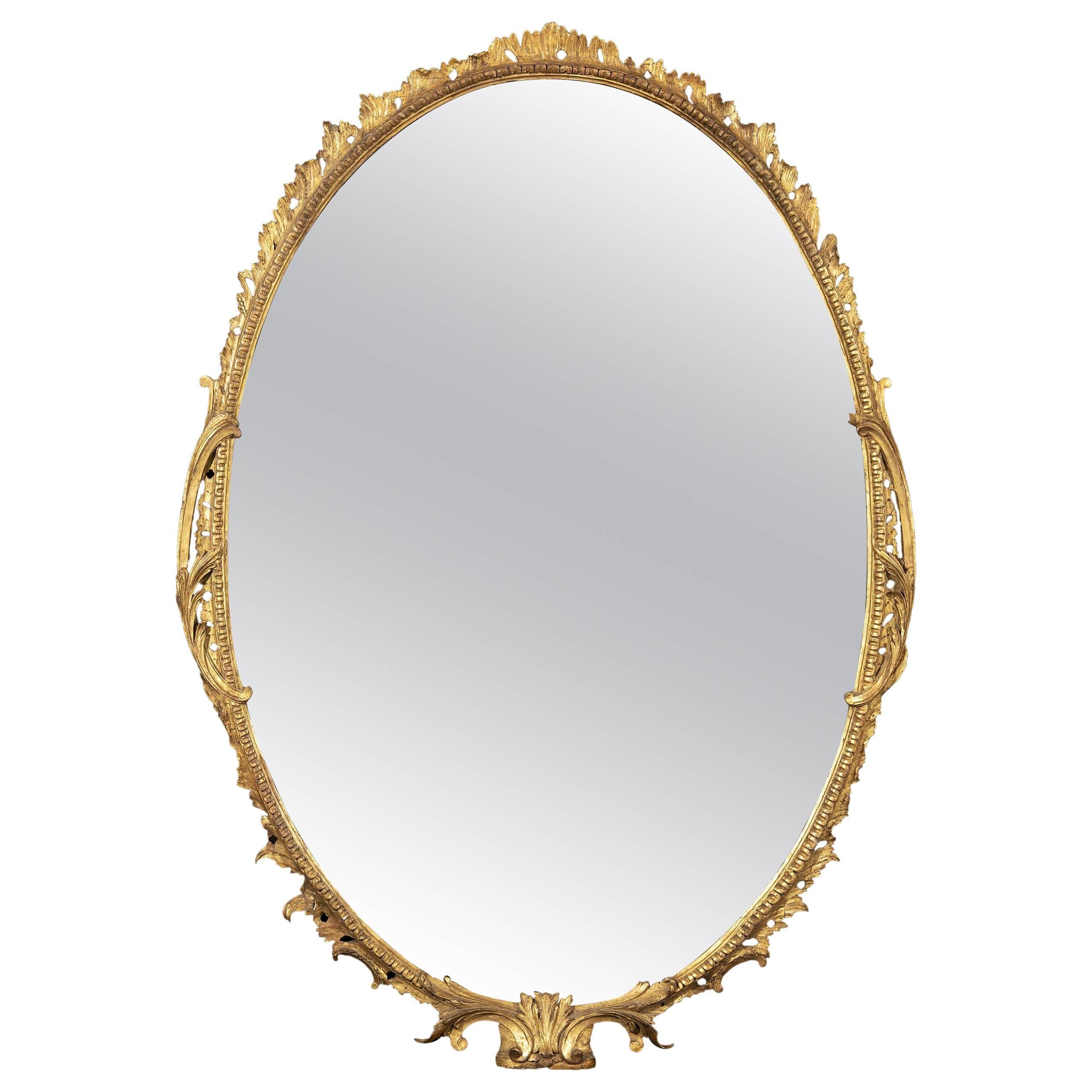 18th Century George III Period Carved Oval-Shaped Giltwood Mirror For Sale