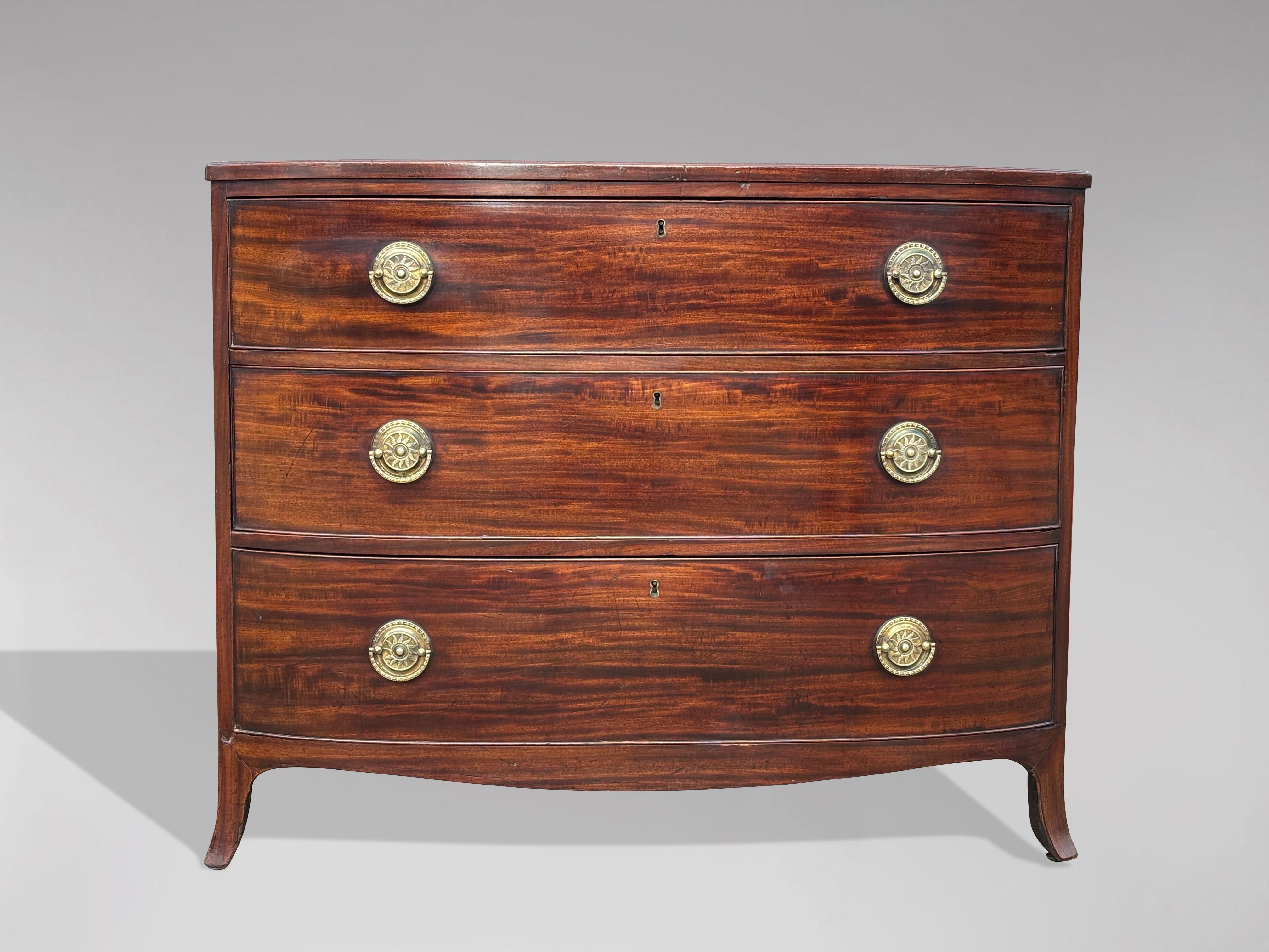 Fine 18th-Century George III Period Mahogany Bow-Fronted Chest of Drawers  

A fine quality 18th-century George III period bow-fronted chest of drawers, crafted from beautifully figured solid mahogany and dating from circa 1790. The rectangular