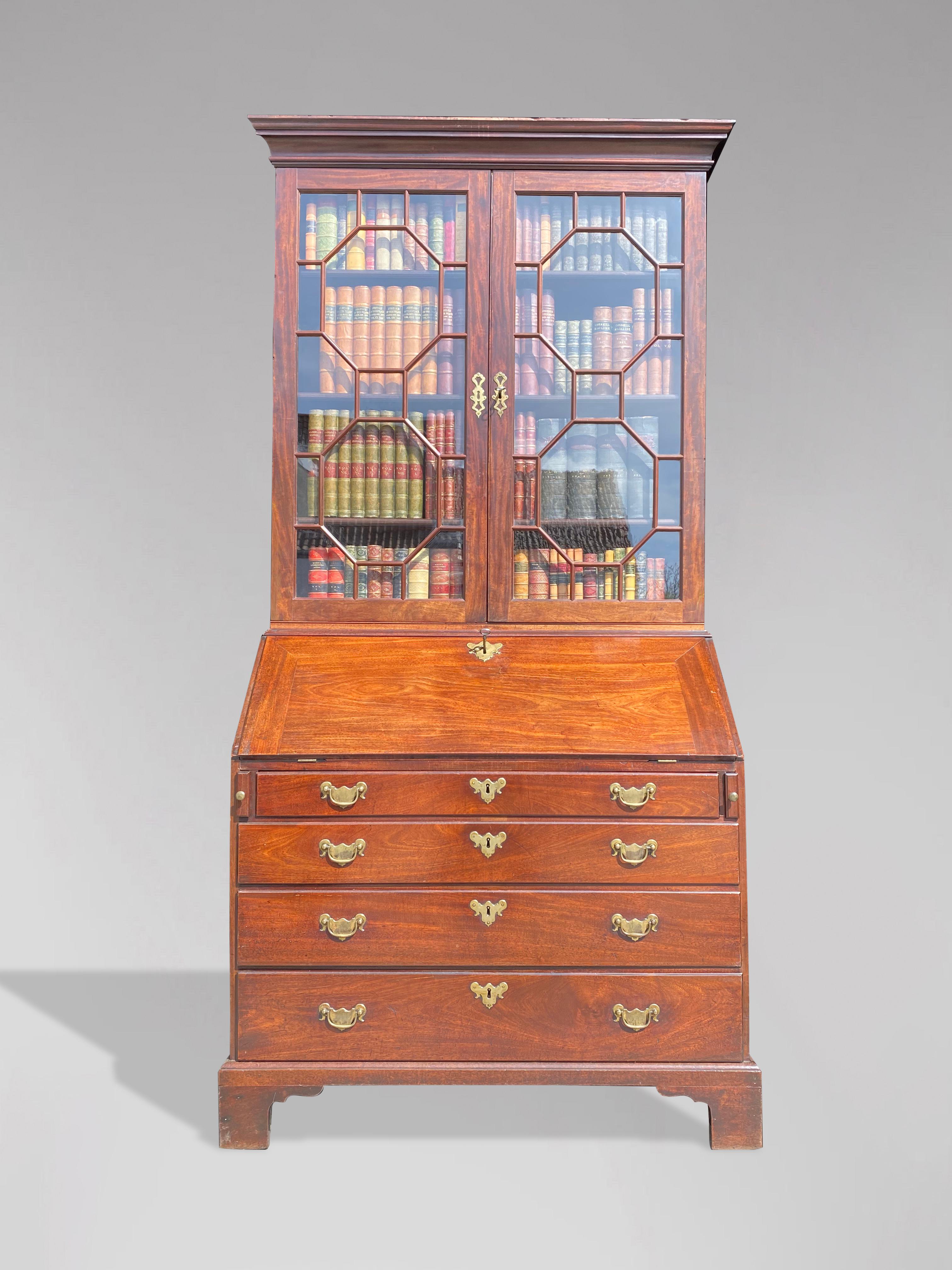 A stunning quality 18th century, George III period mahogany bureau bookcase retaining the original patina. Well proportioned mahogany bookcase with moulded cornice above a pair of astragal glazing doors enclosing three adjustable shelves. The flamed