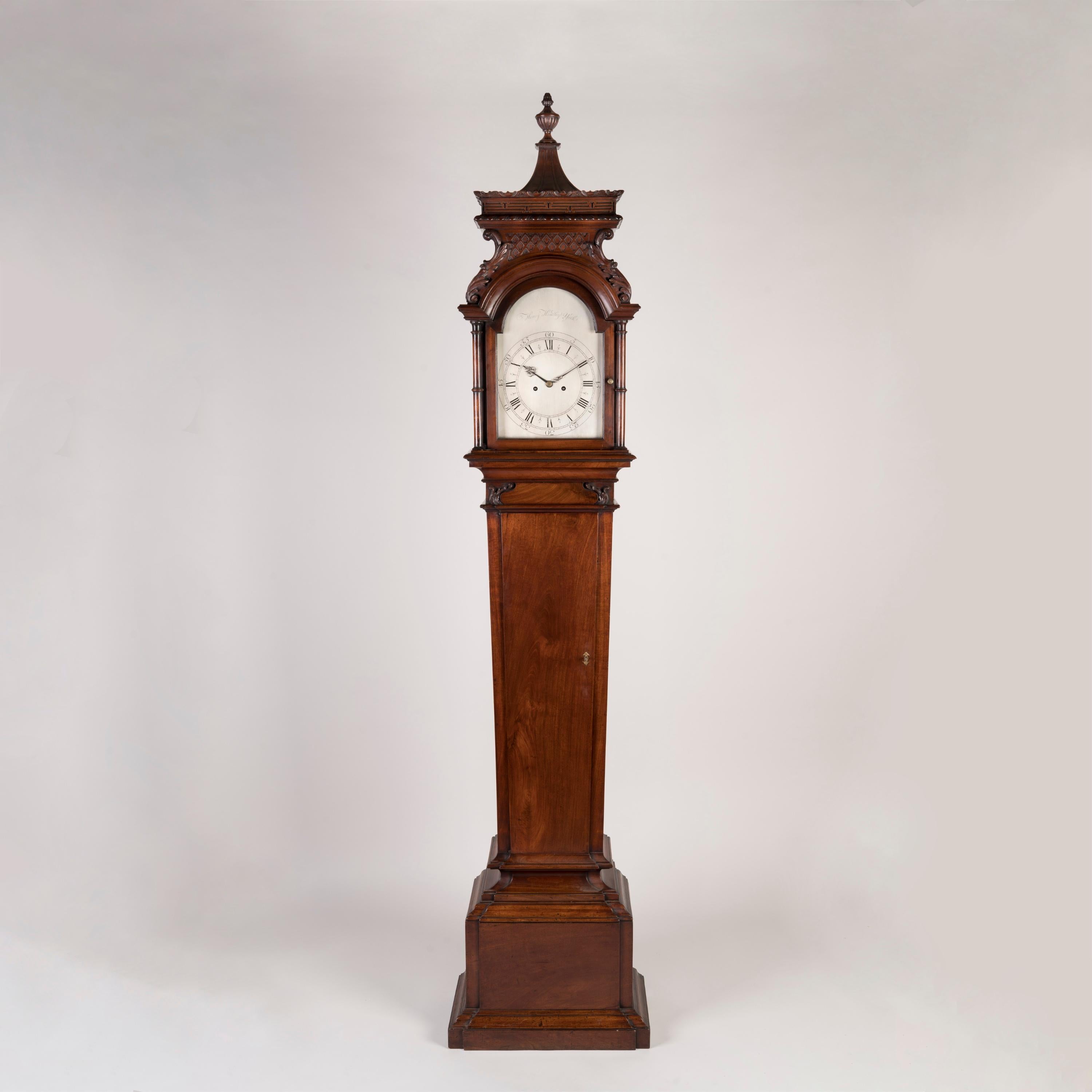 A George III Period Mahogany Longcase Clock
In the Chinese Chippendale Style

By Henry Hindley of York

A fine eighteenth century timepiece, the mahogany case designed in the very fashionable Chinese Chippendale style and inspired directly by
