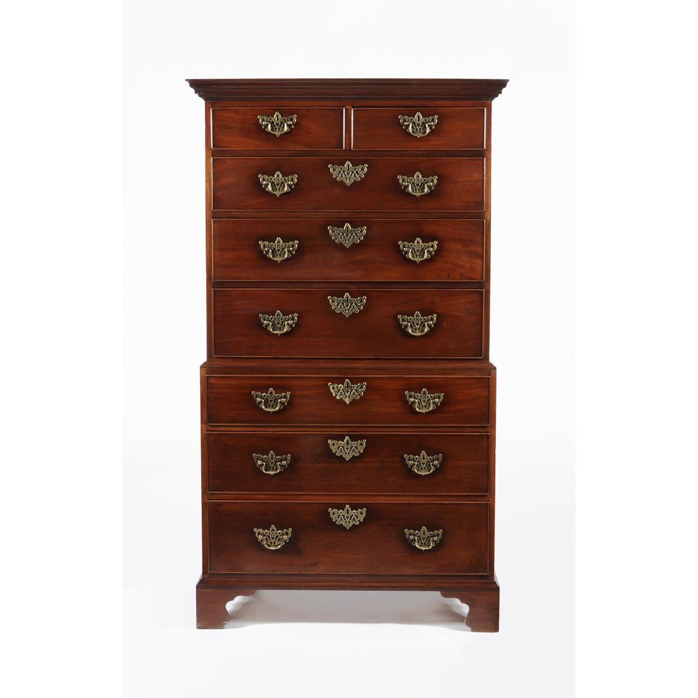 We are delighted to offer for sale this fine George III period small mahogany Chest on Chest, circa 1780. The moulded cornice above two short and six long graduated drawers standing on shaped bracket feet.

Height: 175cm (68.9in)
Width: 100cm
