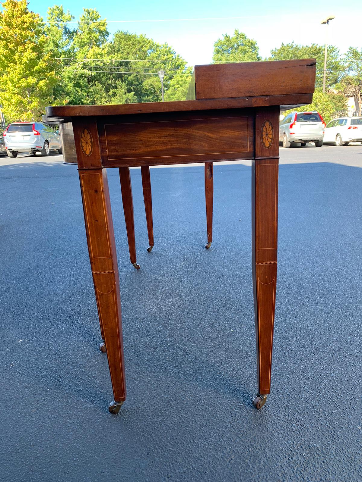 18th century George III shaped mahogany serving table, possibly Irish
string inlay and marquetry details
Measures: 74.5
