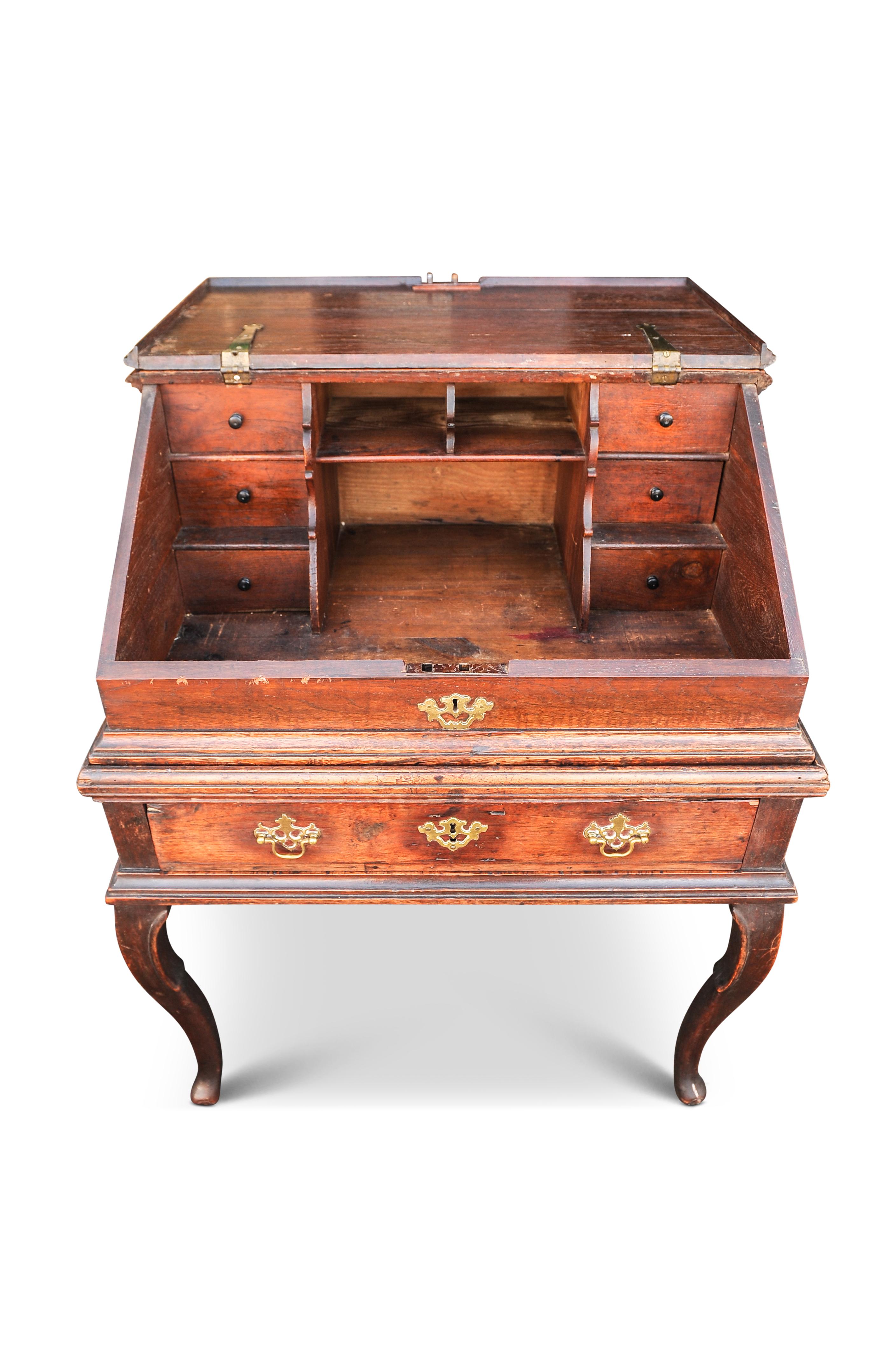 18th Century Georgian Bureau Desk on Stand. Fold Front Top Reveals A Fitted Interior with Drawers & Pigeonhole Sections Fitted out With Original Brass Batwing Handles & Finishes 1700's

The top section raised on single drawer base with cabriole