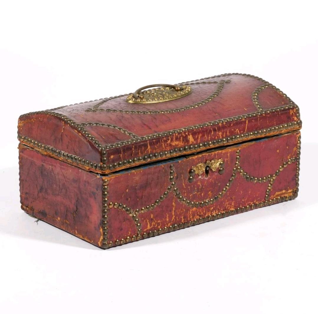 Beautiful, late 18th century Georgian leather box. Retaining the original leather covering with bass tac work and bale. The rich, warm patina of the leather just warming, and it's a great contrast to the blue silk damask interior.
Everything about