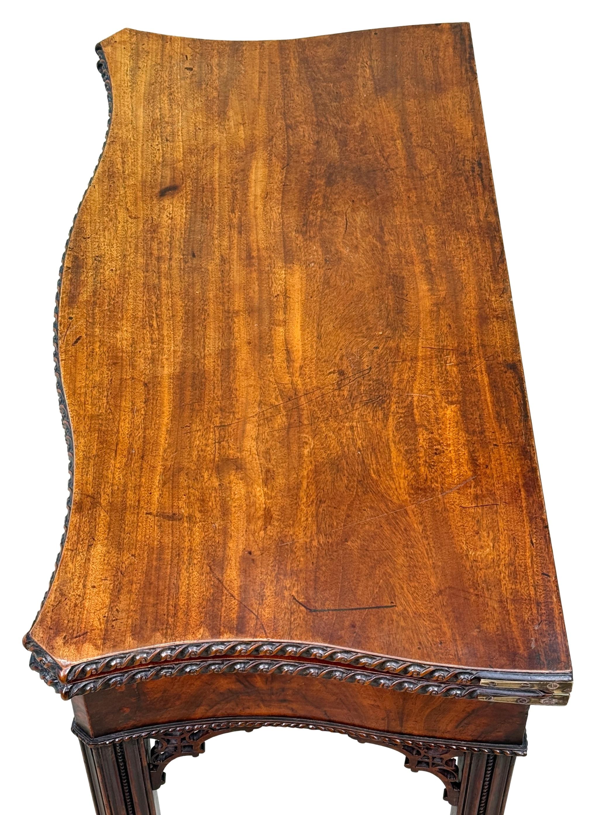 A Very Fine Quality 18th Century, Chippendale Period, Georgian Mahogany Serpentine Shaped Tea Table, Retaining Exceptional Colour & Patina Throughout, The Shaped Foldover Top With Exceptional Crisp Carving To Edge, Over Superbly Figured Frieze With