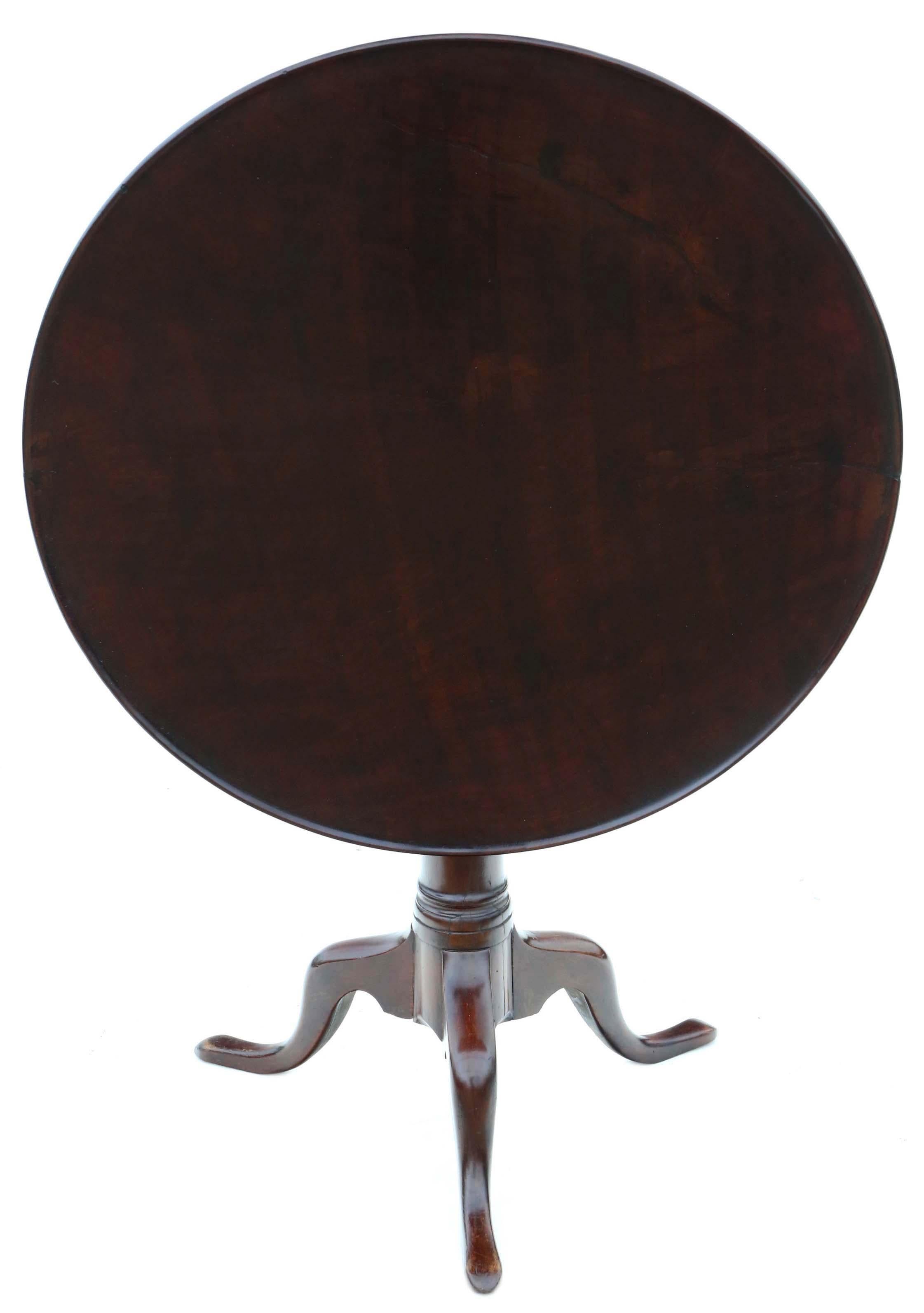 Antique Georgian mahogany tilt-top birdcage supper table from the 18th century. A rare early piece, it is structurally sound with secure joints and a functional catch. The table features a charming gun-barrel stem pedestal and is free from
