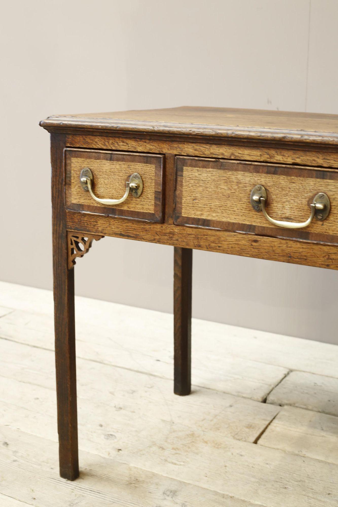 This is a great piece of honest 18th century Georgian furniture. Made from oak with attractive cross banded details around each drawer. Solid condition so perfectly useable and full of character. The drawers all open and shut easily. Nicely shaped