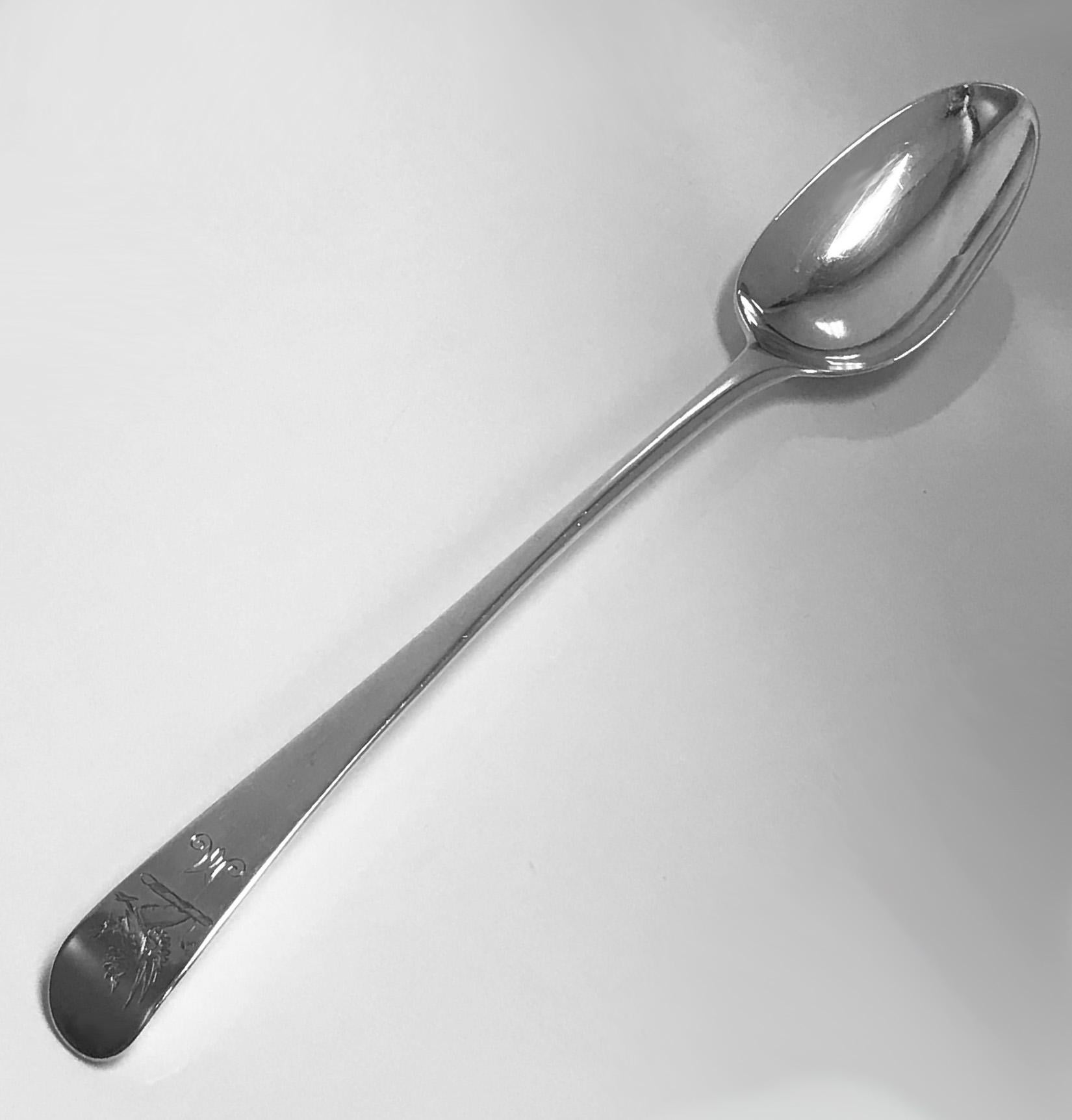 18th century Georgian silver basting spoon, London 1776 Stephen Adams, crest that of a demi griffin with extended claws above initial M. Measures: Length 11.25 inches, Weight: 107.43 grams.