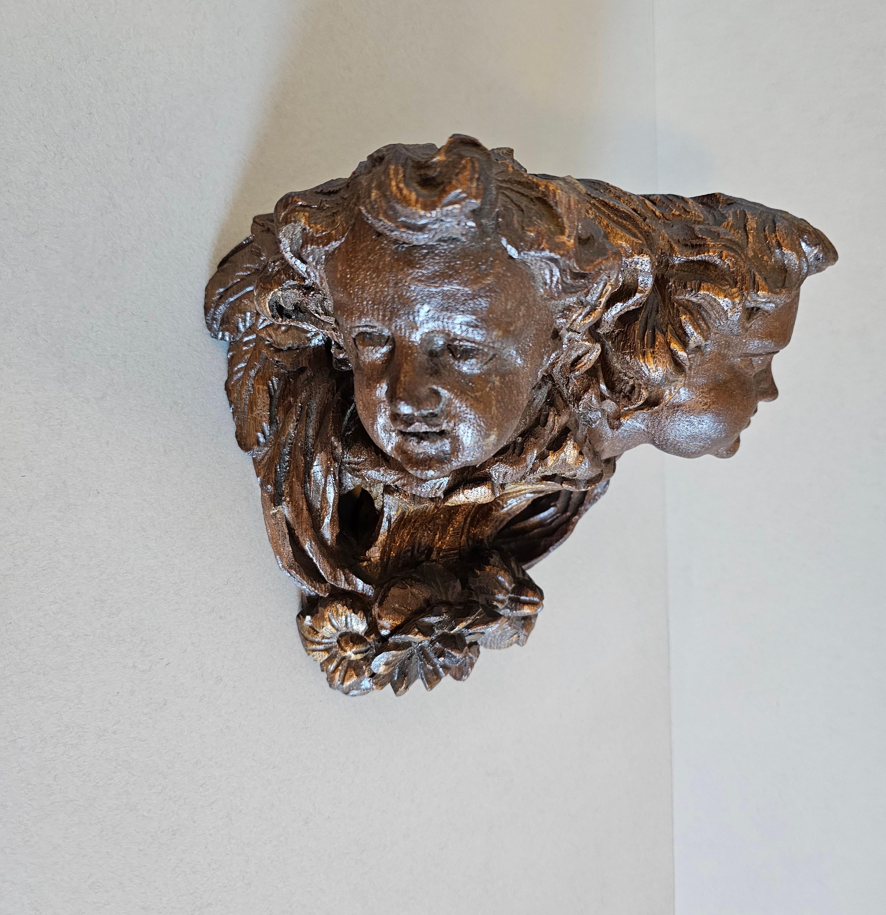 A finely carved Baroque period architectural element, now fashioned as a sculptural bracket shelf. 

Hand-crafted by a master-artisan in the 18th century, originally part of a corbel, likely from a church around the Black Forest region of Southern
