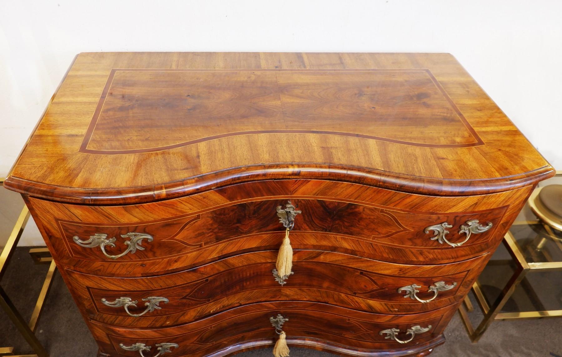 18th century German Baroque chest of drawers, walnut.