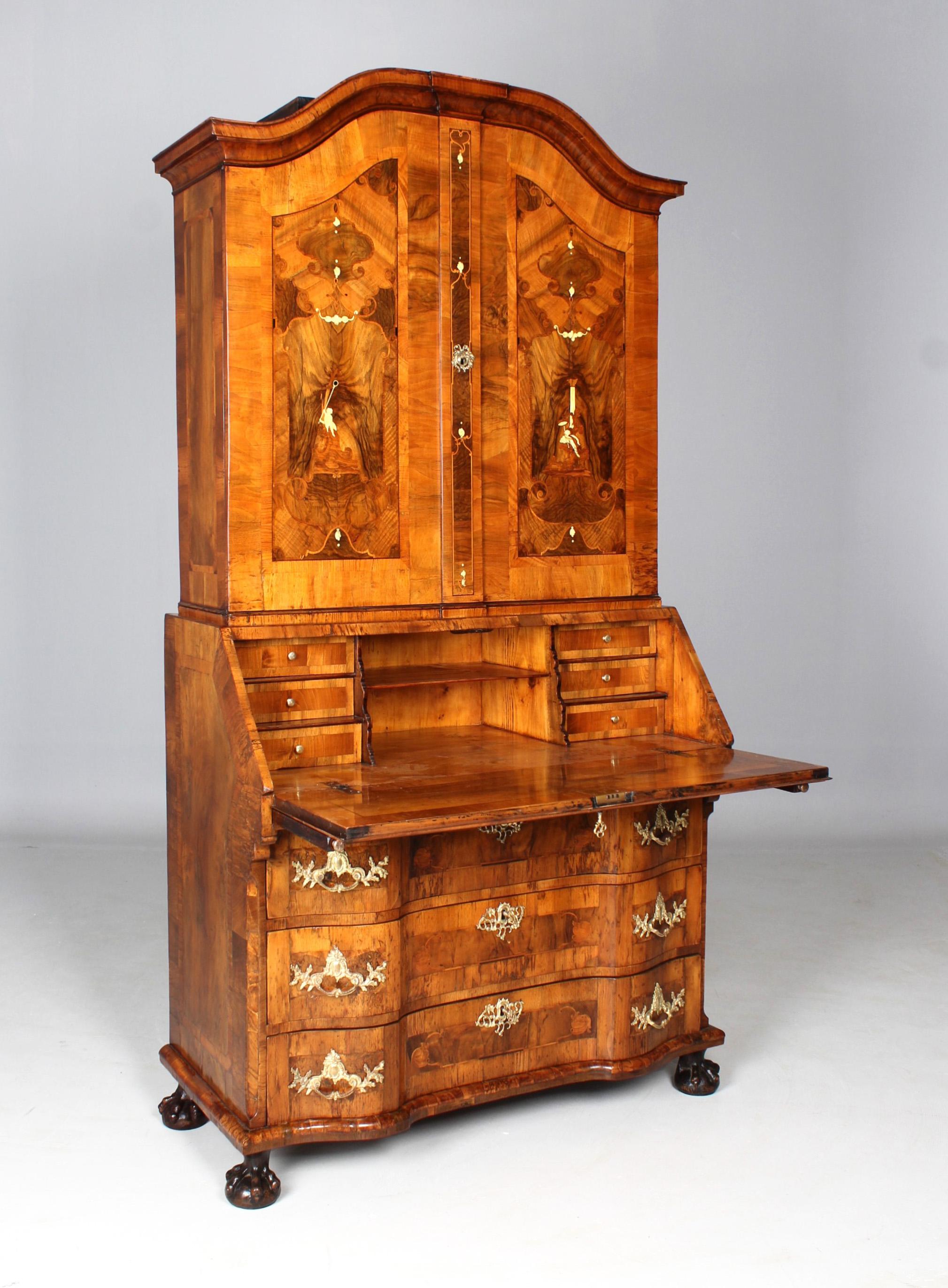 Baroque top secretary with Fine marquetry

Brunswick
walnut etc.
Baroque around 1750

Dimensions: H x W x D: 215 x 119 x 56 cm

Description:
Beautiful slender writing cabinet from the Lower Saxon Baroque period circa 1750-60.

Two-part