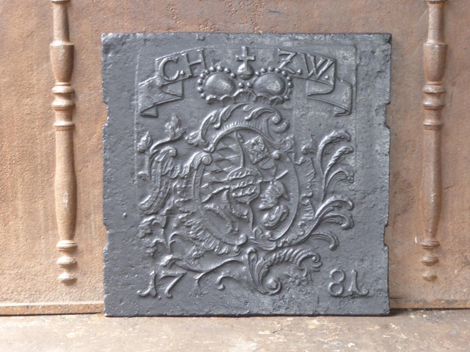 18th Century German Louis XV fireback with an unknown coat of arms. The fireback is made of cast iron and has a black / pewter patina. The condition is good, no cracks.







