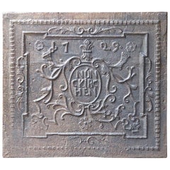 Plaque de cheminée Louis XV allemande du XVIIIe siècle "Nünckirchen  / Dosseret