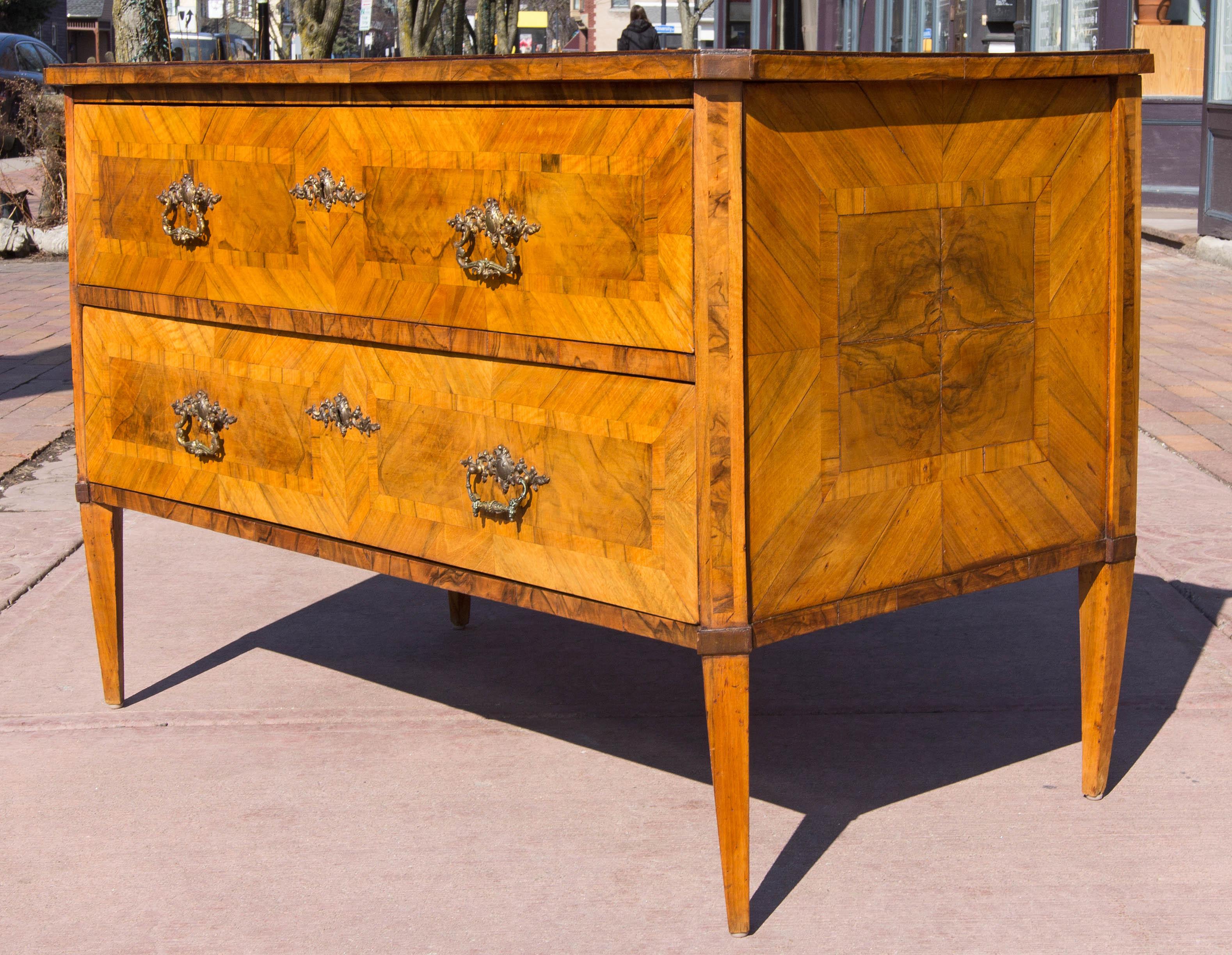 German neoclassical two-drawer walnut veneered commode. Good old finish with rich color, circa 1790. Original hand forged locks. Drawers slide nicely.