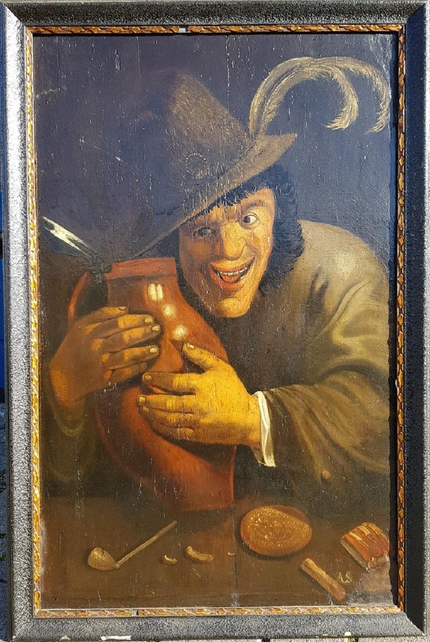 Lovely 18th century German painting depicting a happy drinking man holding a jug presumably with an alcoholic beverage and is right under monogrammed with A S, it has some old restorations. The painting has a black wooden frame with a gold colored