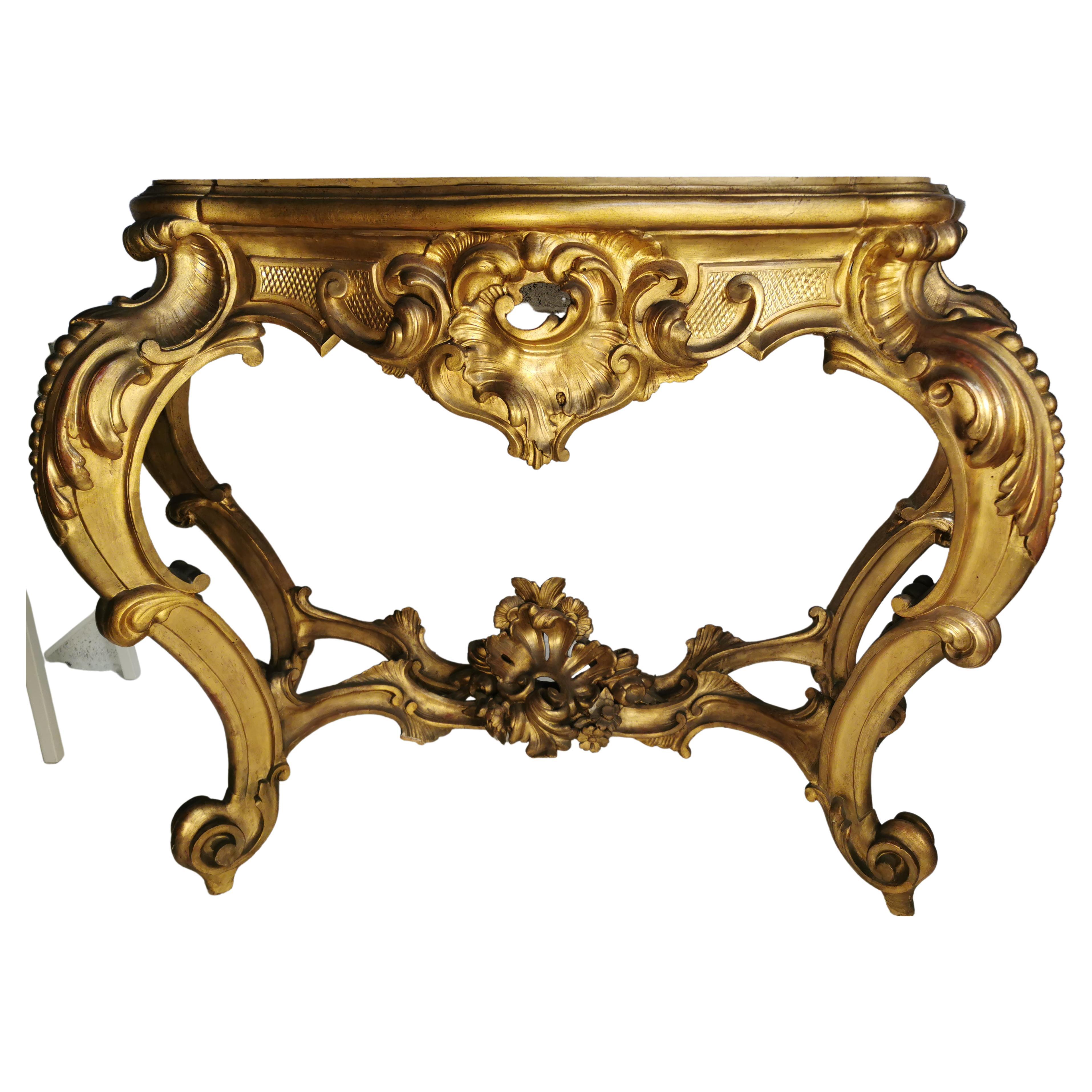 Big Dimension handcrafted golden console table, circa 1750-1760 Louis XV /  Italy Rome. Yellow golden painting what you see inside the console was used in 1700s, it is the same what you find behind the candelsticks and the scrolls of the 18th