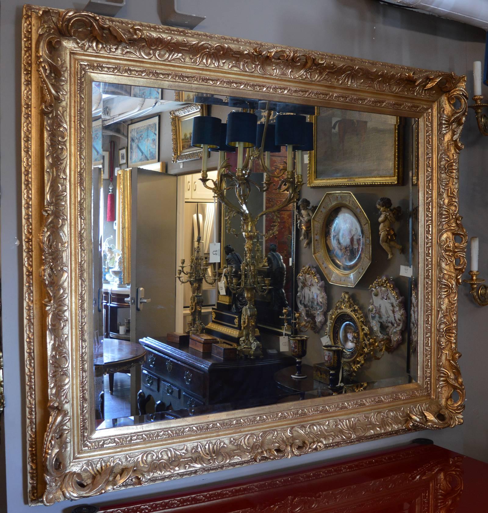 18th century French hand-carved mirror with gilding.