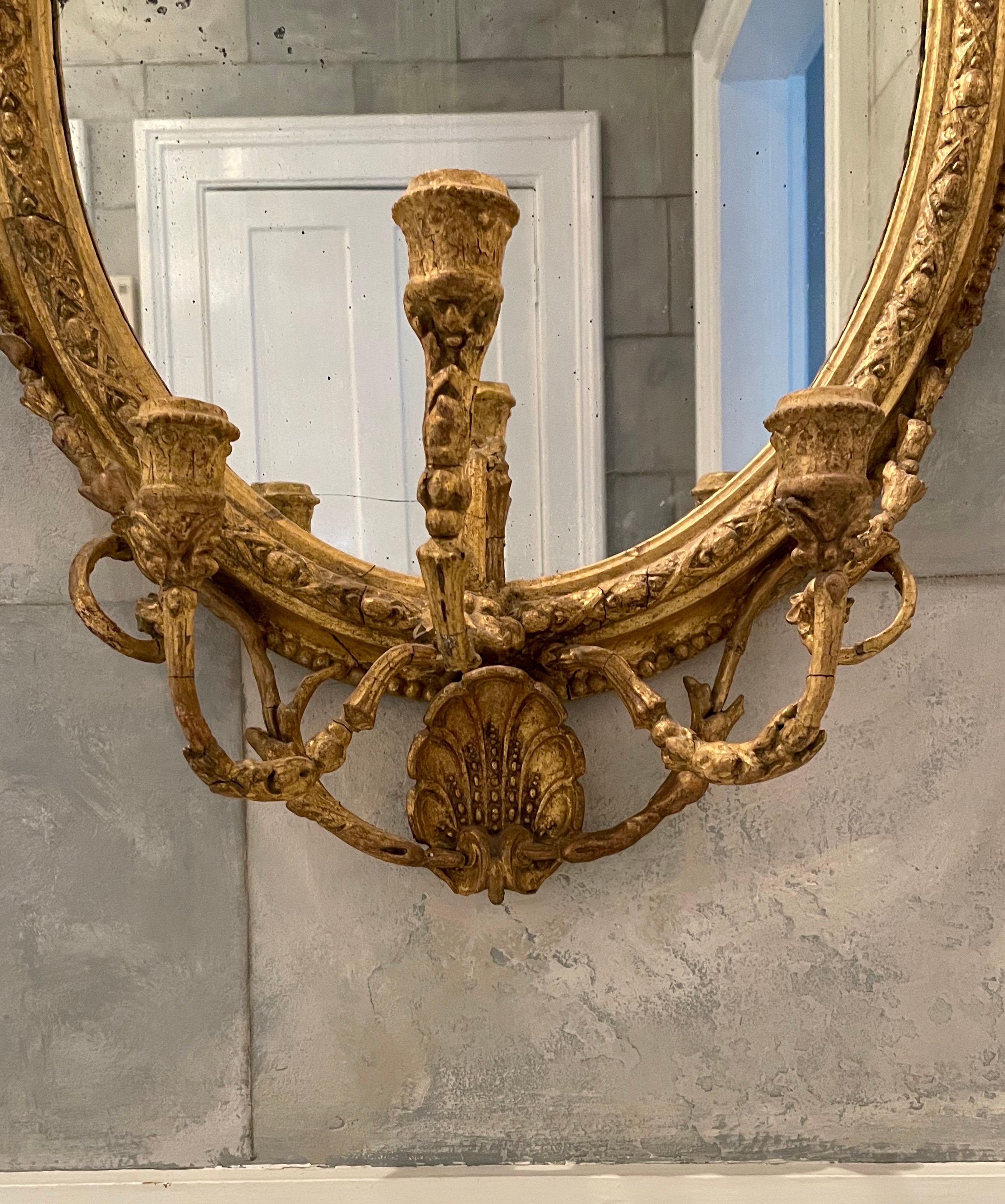 18th Century and Earlier 18th Century Gilded Oval Girandole Mirror with Triple Candelabra For Sale