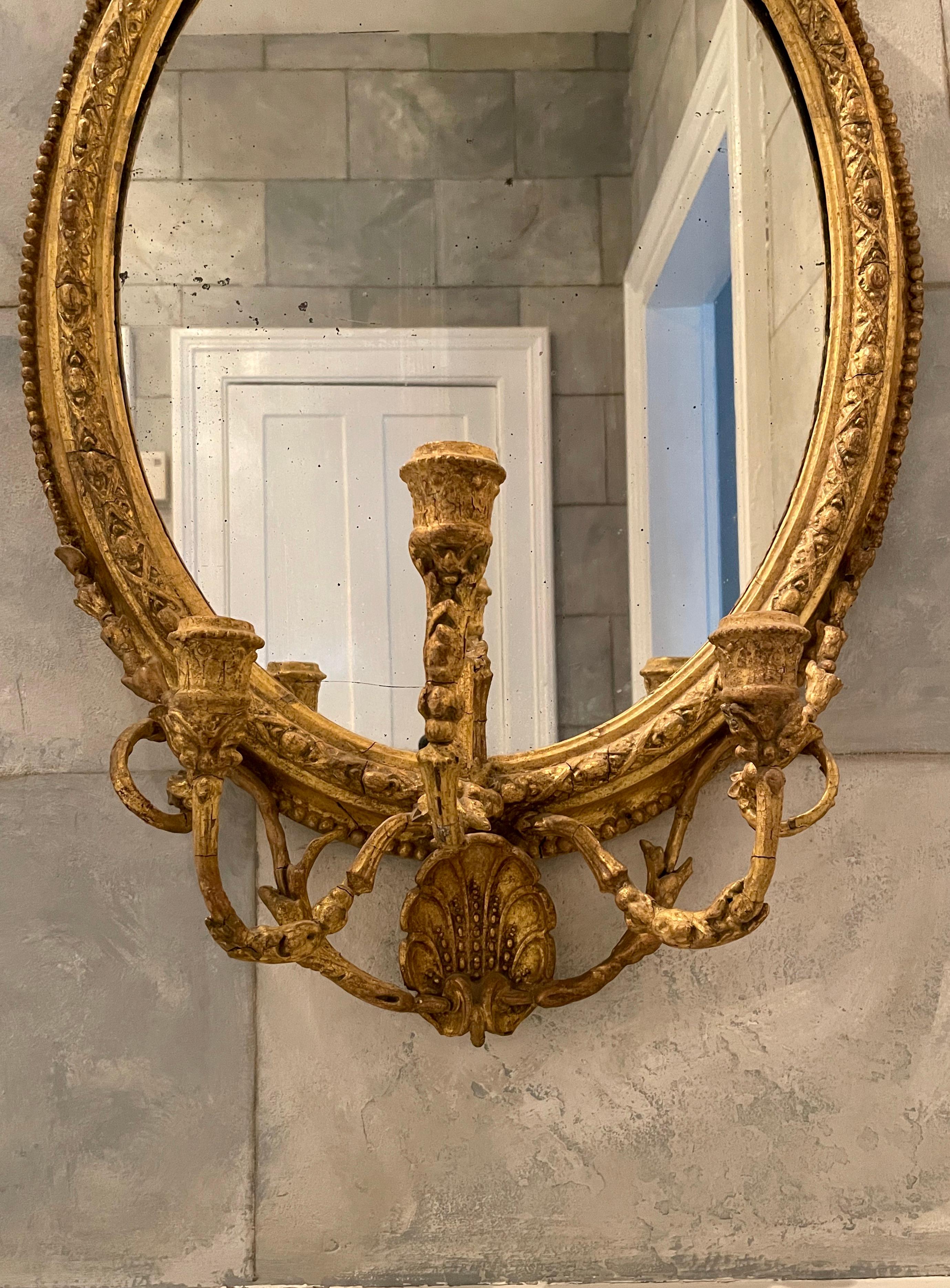 George III 18th Century Gilded Oval Girandole Mirror with Triple Candelabra For Sale