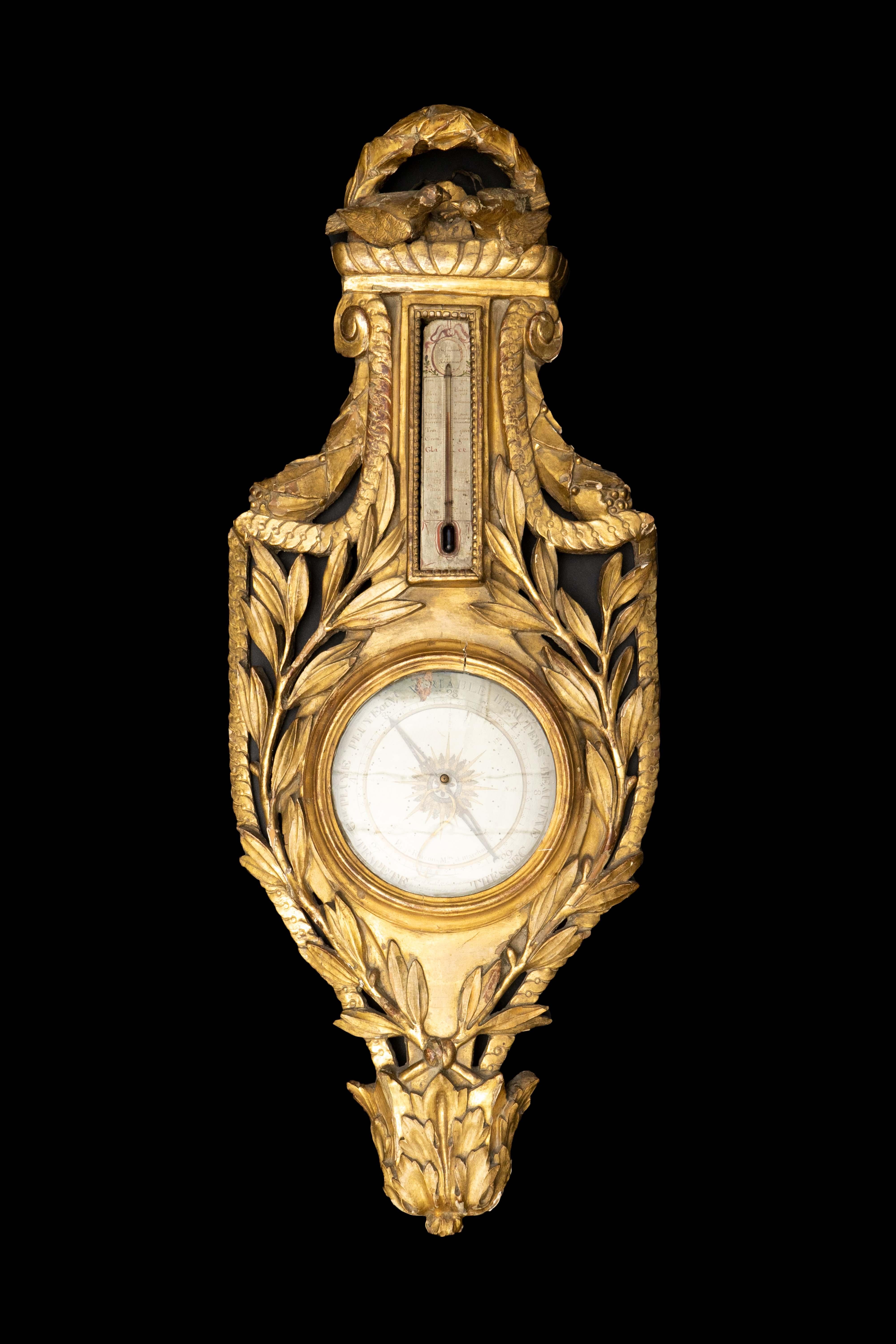 This beautiful 18th-century gilded barometer is a true masterpiece, signed on the dial by J. Ruscon. The exquisite craftsmanship is evident in every detail of this piece, from the intricate design to the high-quality materials used in its