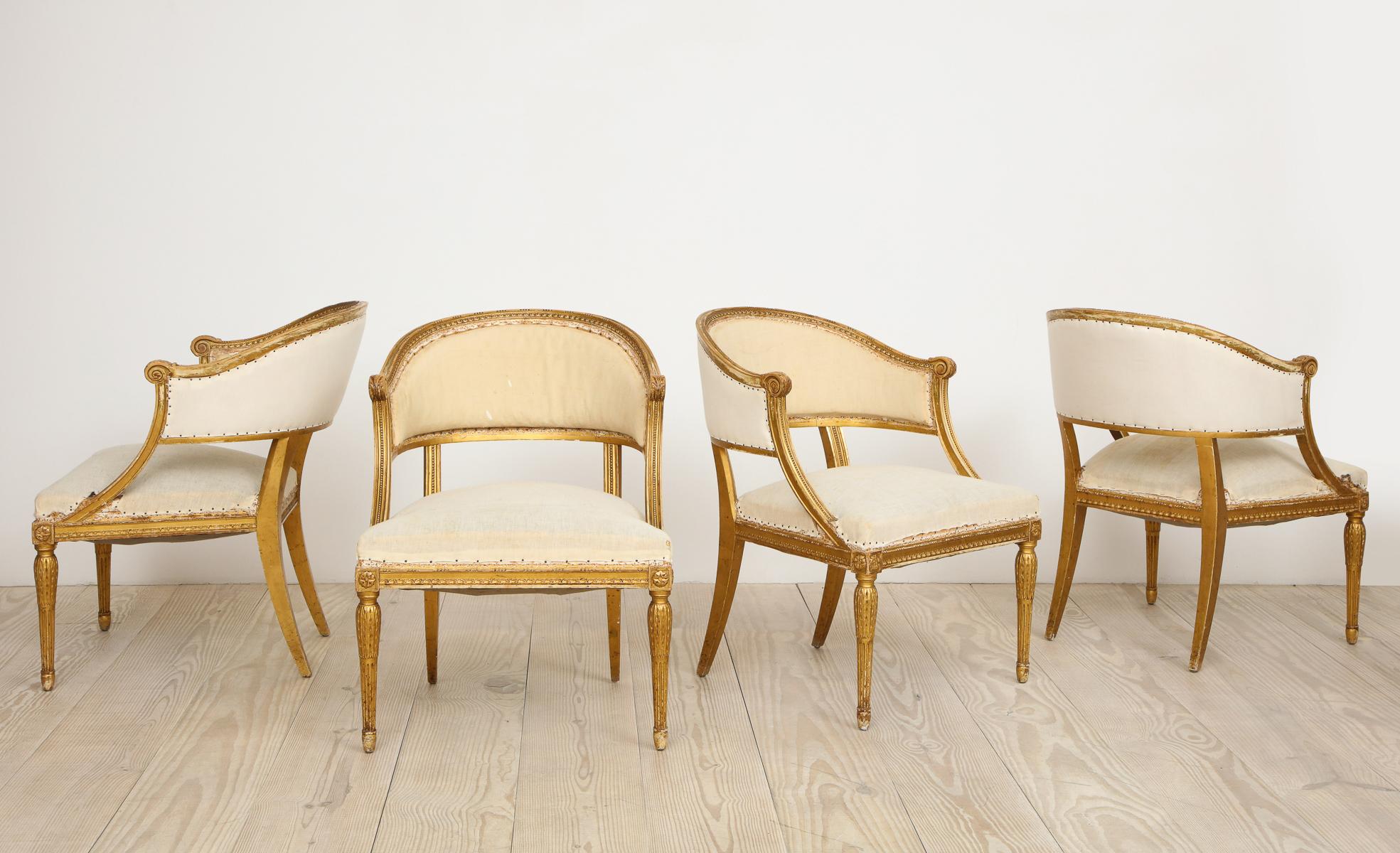 18th century Gustavian bucket chairs, set of four (4), giltwood, origin: Stockholm, Sweden, circa 1790 - 1800. 

Elegant proportions, beautifully hand-carved, extremely comfortable, neoclassical set of four barrel back chairs with very special