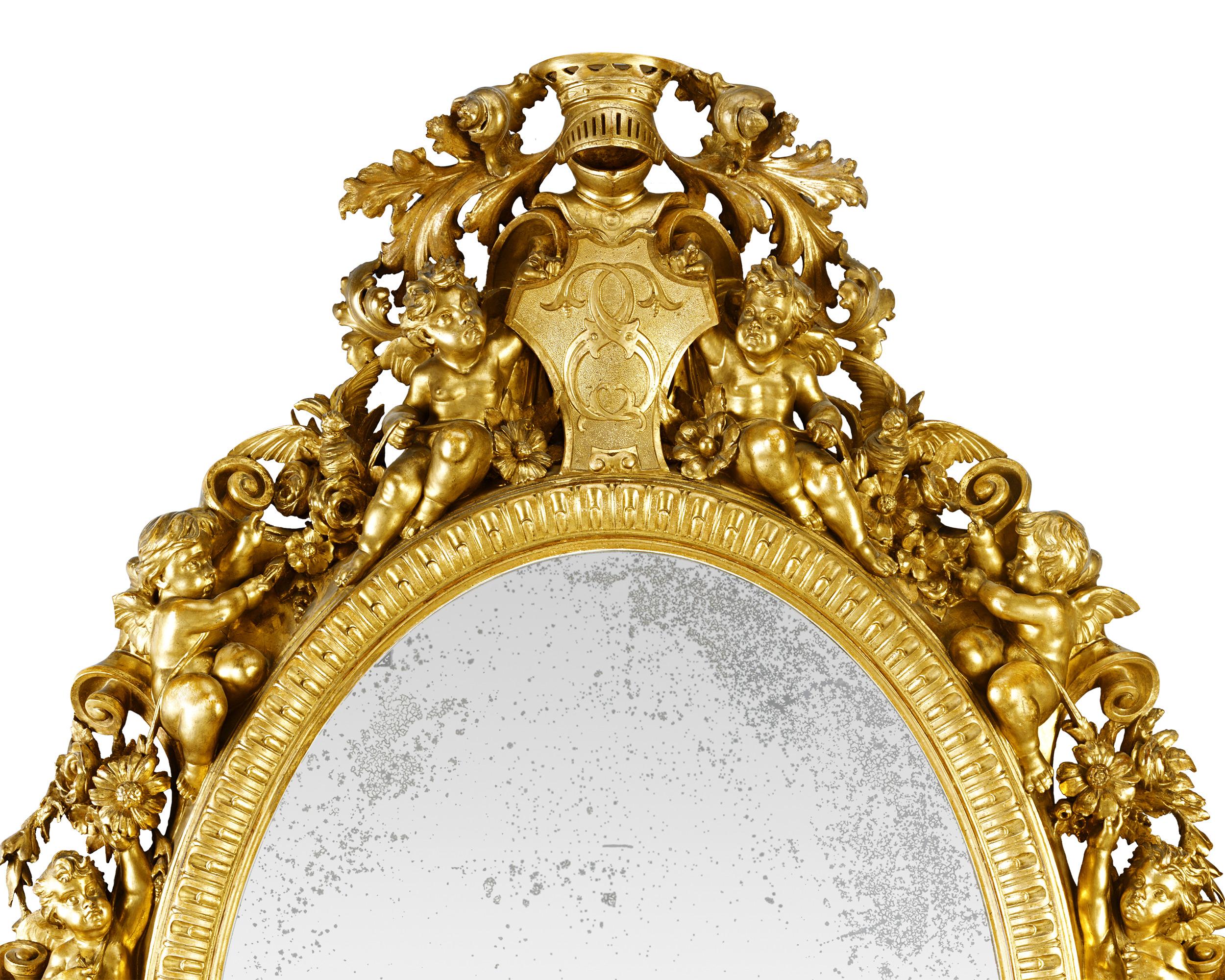 The exquisite details of this hand carved Italian mirror are matched in grandeur by its monumental size. At over 6 feet tall and 4 feet wide, this mirror is an extraordinary feast for the eyes. Also known as a “glace en bois doré,” this 18th-century