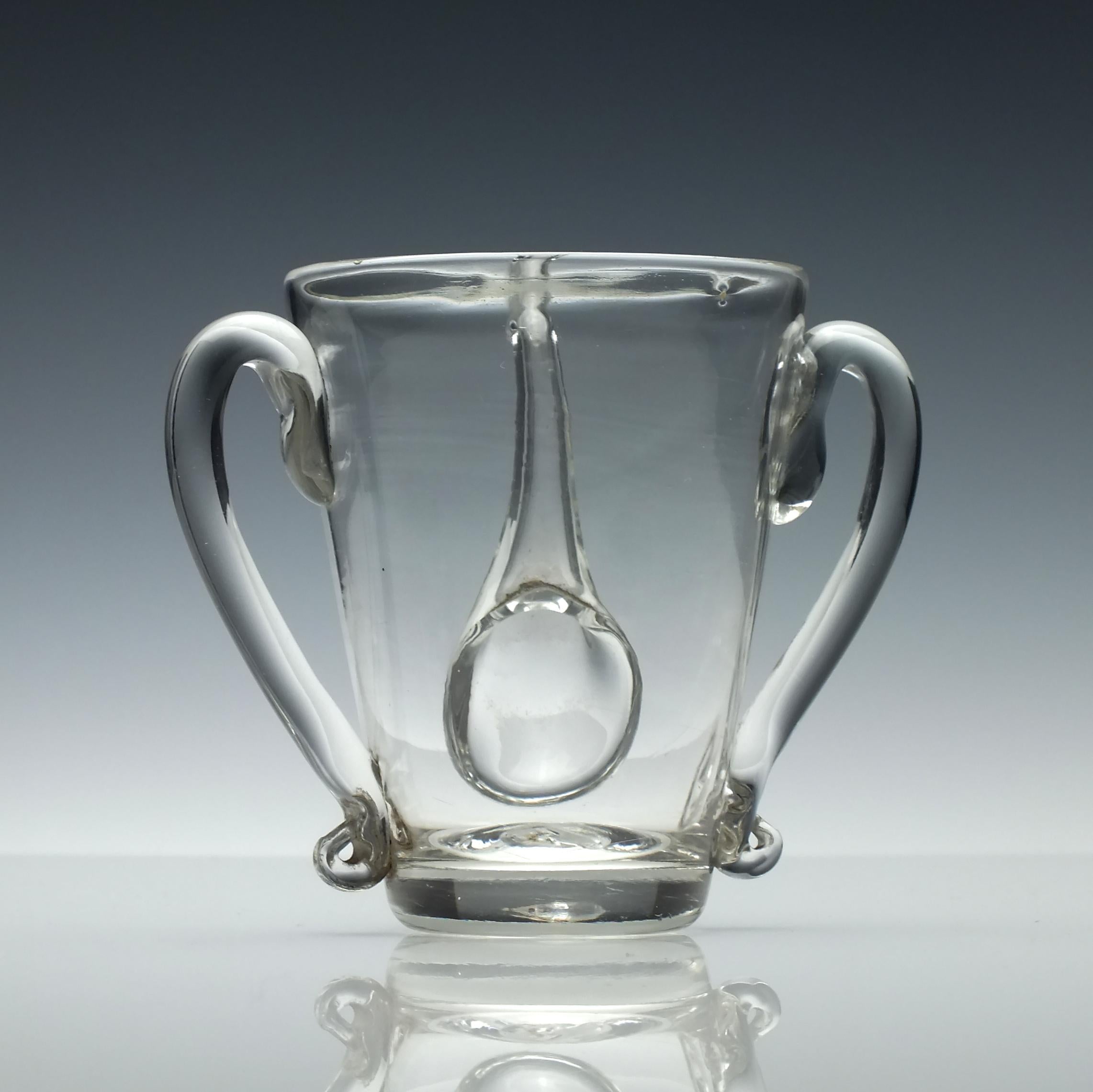 Date and origin: 

England, circa 1770. Period of George III.

Condition:

Age-related wear as shown. The spout has been chipped. 

Dimensions: 

Height 9cm, diameter 10.8cm from handle to handle.

Weight

173 grams

Technical