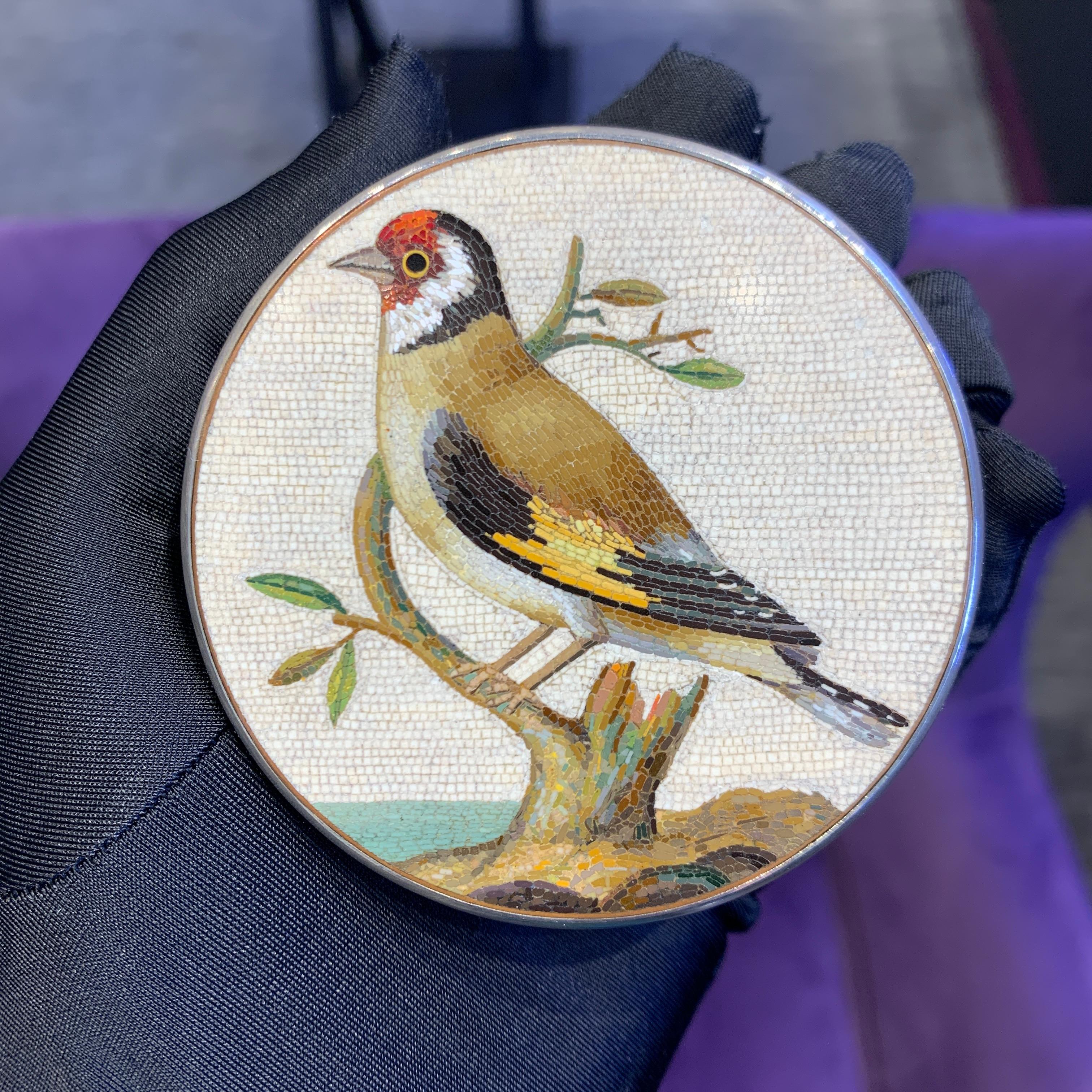 18th Century Goldfinch Micro Mosaic Box

A sterling silver box with felt lining and a lid set with a stunningly detailed micro mosaic of a European Goldfinch perched on a branch. The micro mosaic is attributed to the late 18th  century artist