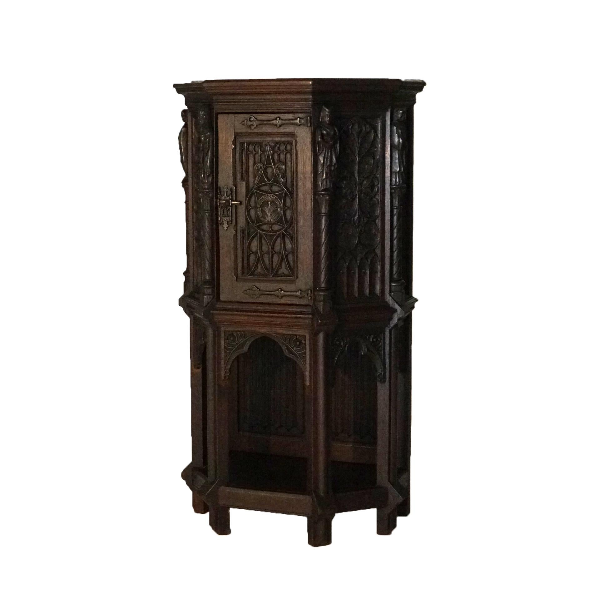 ***Inquire About Reduced In-House Delivery Rates - Reliable Professional Service & Fully Insured***

Antique 18th Century Gothic Heavily Carved Oak Figural Wine Cabinet with Monk Figures, Scroll and Foliate Elements C1750

Measures - 49.5