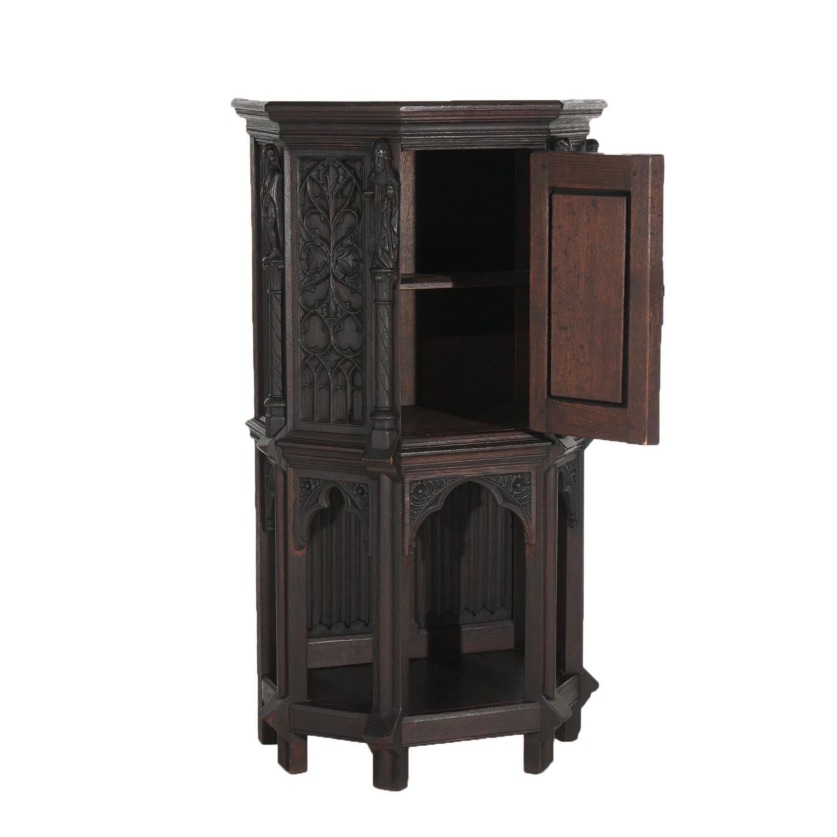 European 18th Century Gothic Heavily Carved Oak Figural Wine Cabinet C1750