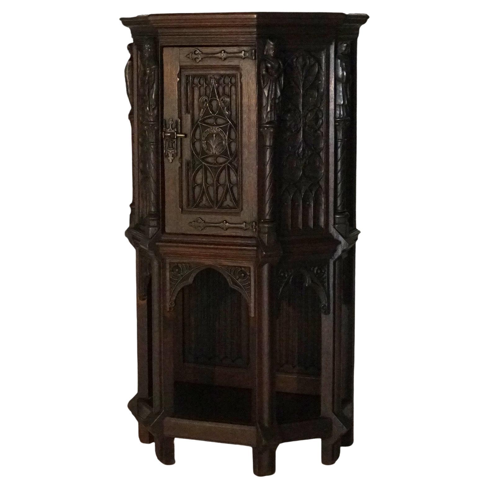 18th Century Gothic Heavily Carved Oak Figural Wine Cabinet C1750
