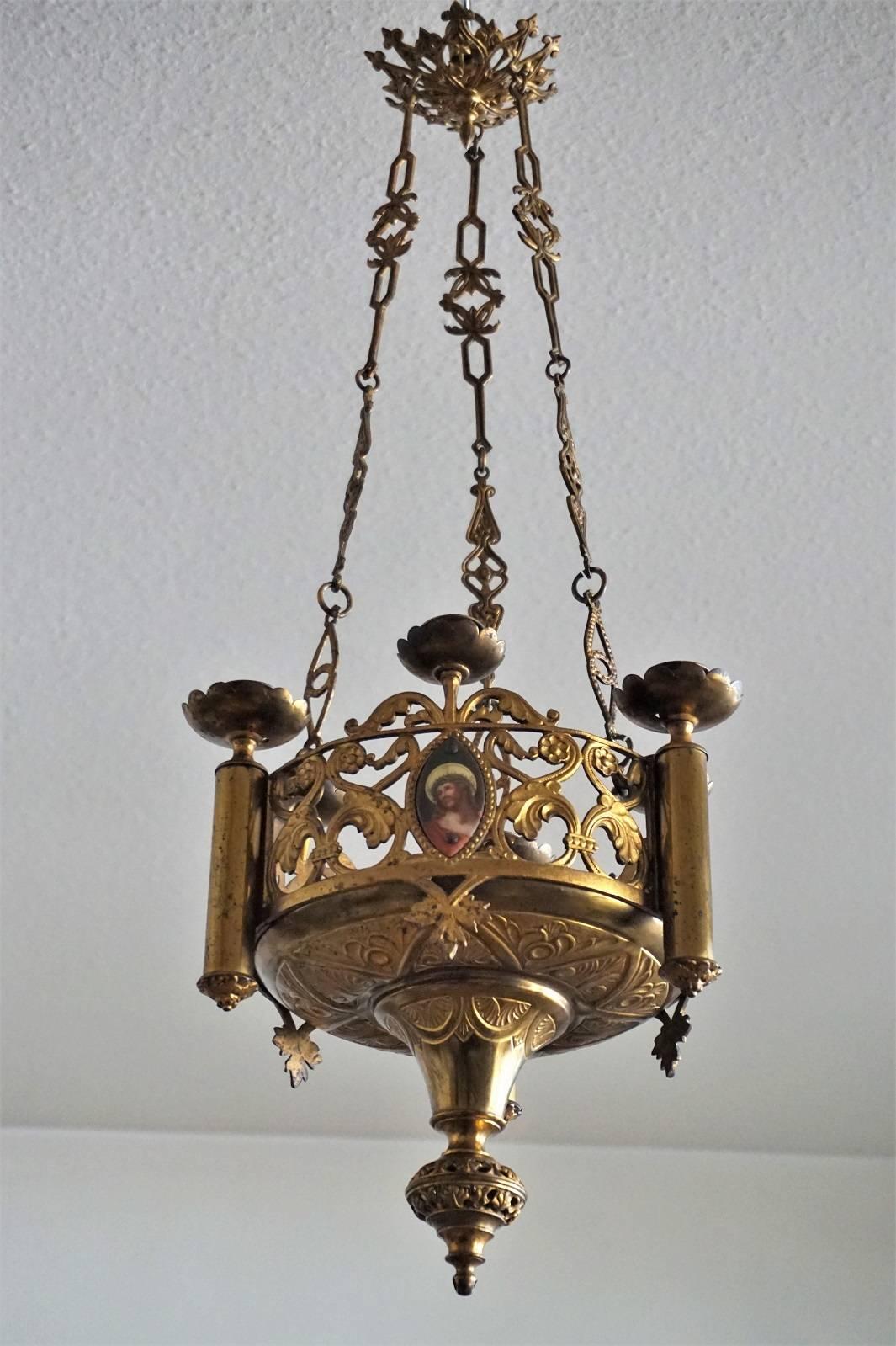 Stunning Gothic Revival style fire-gilded bronze and parcel-brass church candle chandelier / hanging sanctuary lamp, Spain, late 18th century, probably from a family with a private chapel. Crown shape body decorated with three hand-painted porcelain