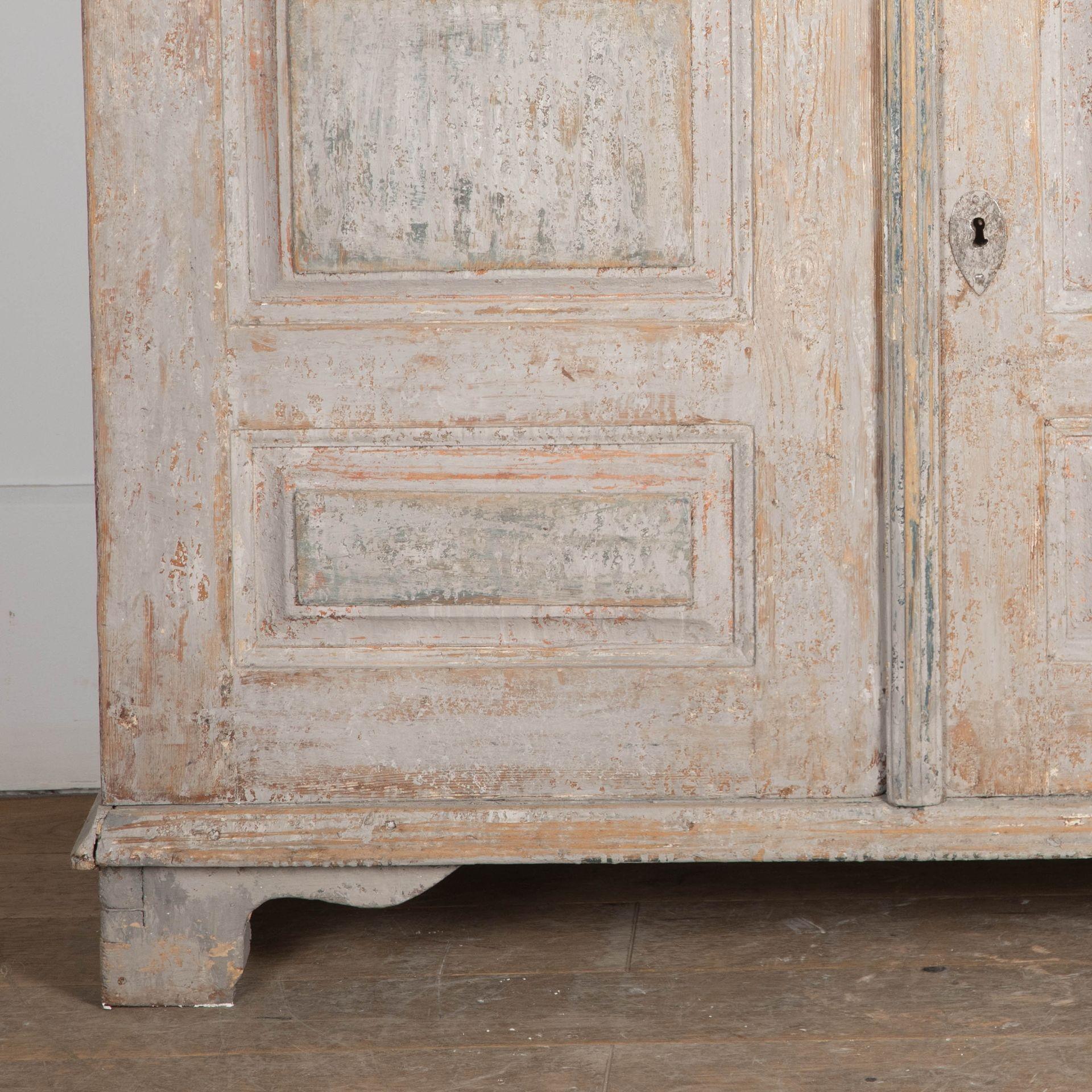 Late 18th Century Gustavian Cupboard with four panelled doors.
Later painted with original interior.