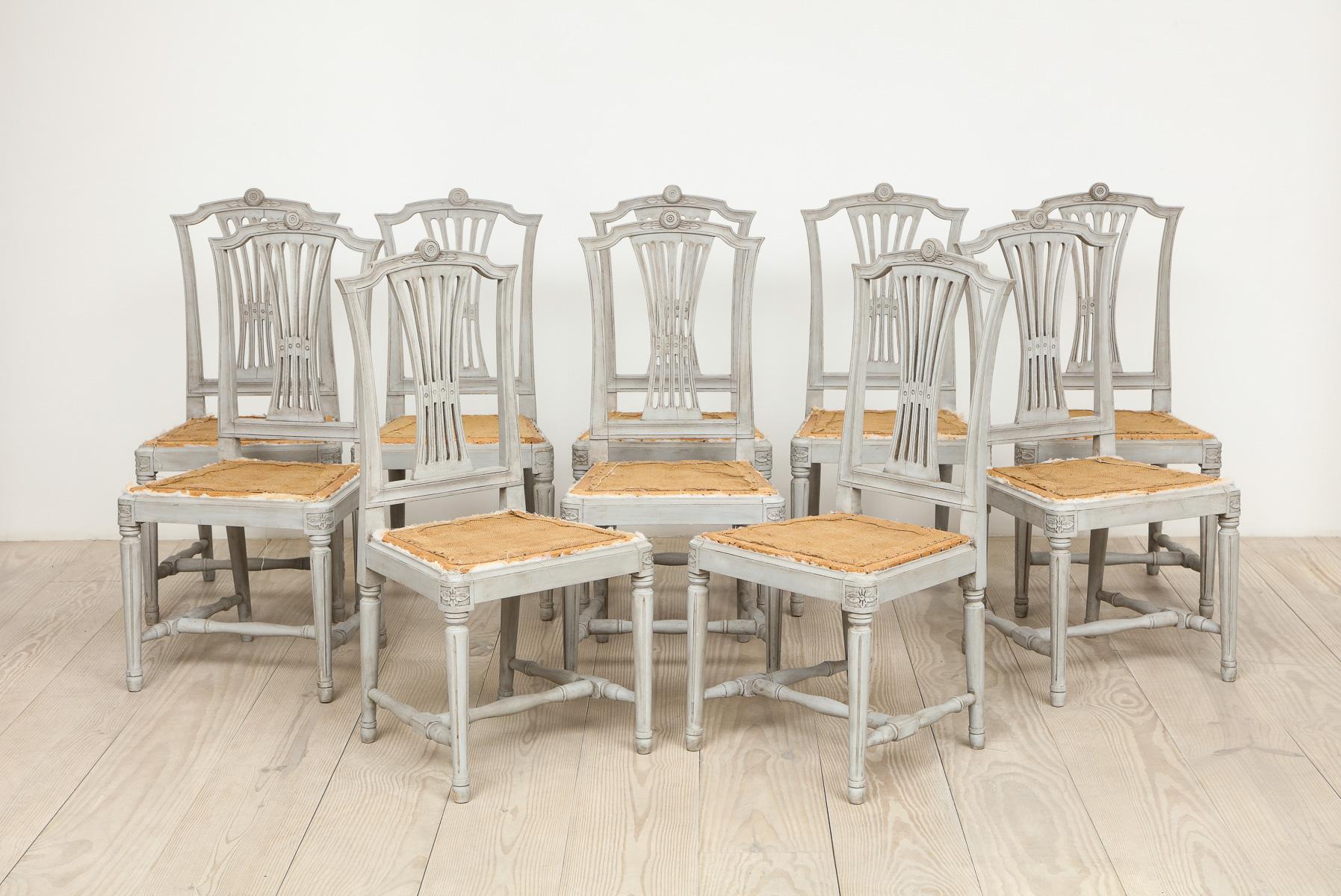 Swedish, 18th century Neo-classical Gustavian set of dining chairs with drop-in seats, set of 10, origin: Sweden, circa 1790.

The Gustavian, neoclassical period is characterized by a return to symmetry and straight lines, antique motifs such as