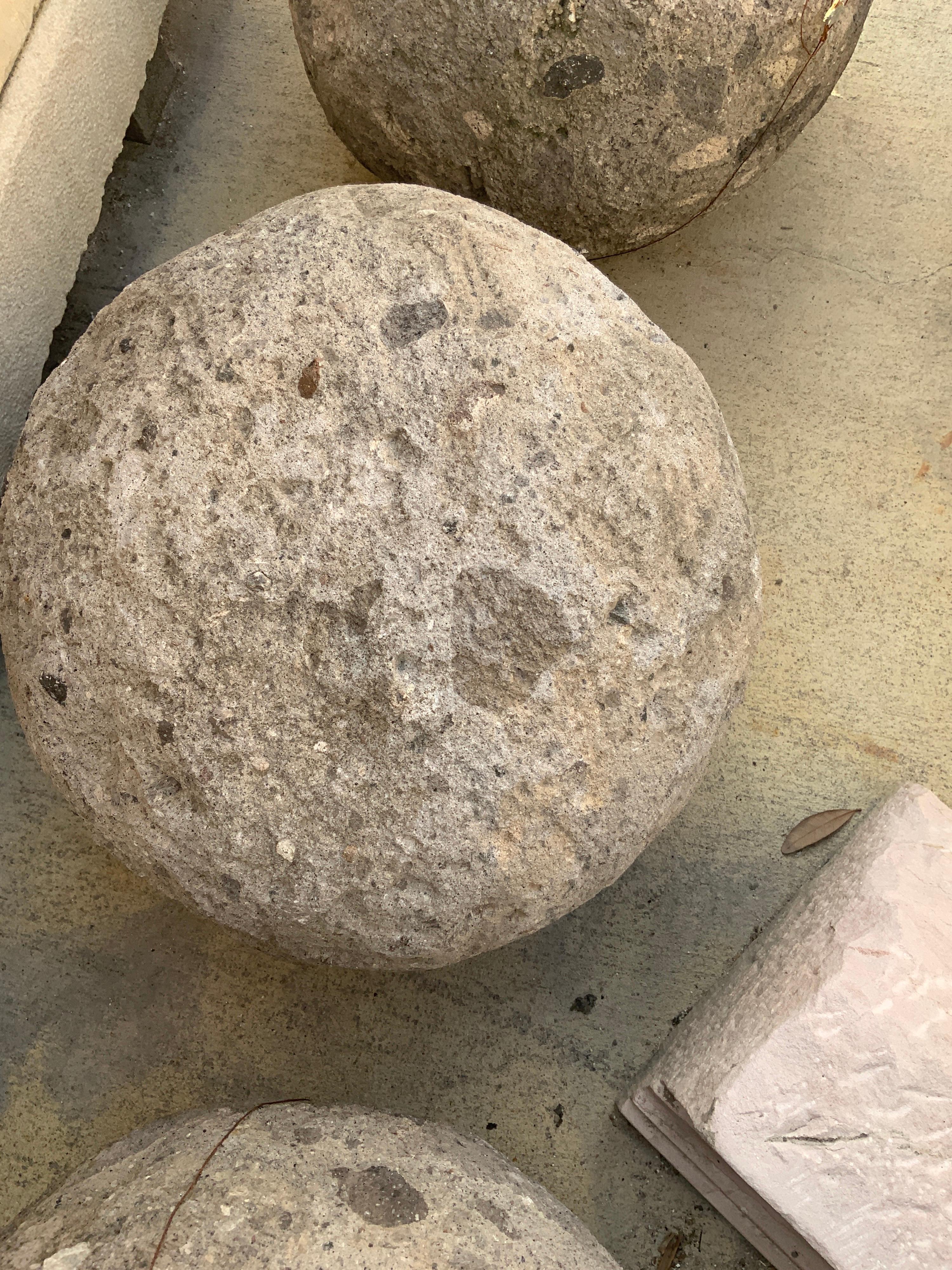 Resembling ancient catapult and canon balls these spheres are found in several sizes and can be used to accent your garden.