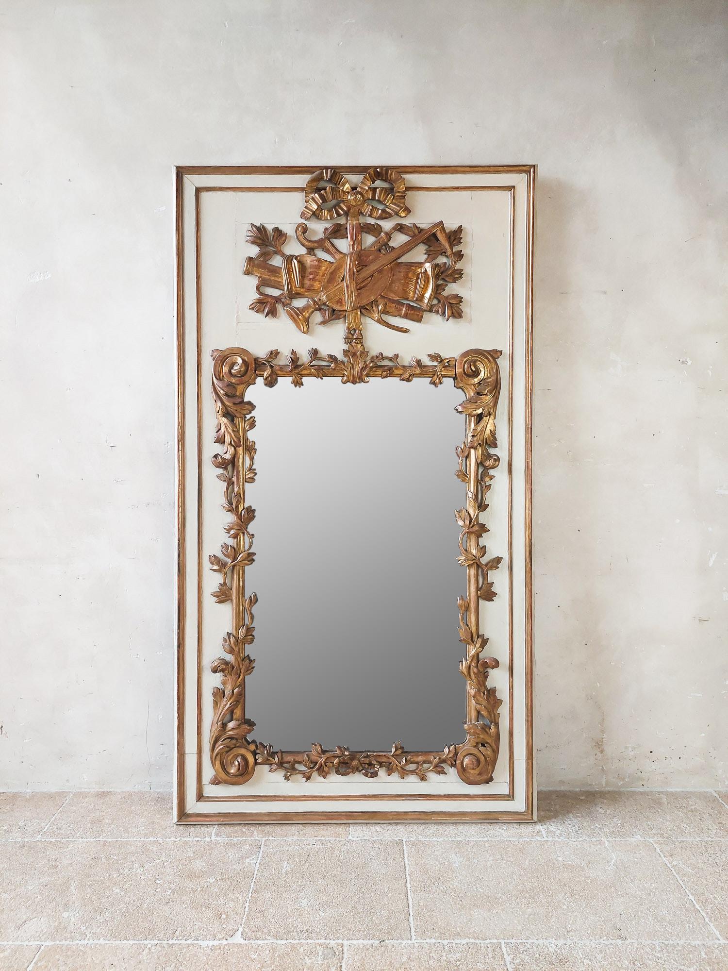Patinated 18th Century Hand-Carved Gilt Trumeau Mirror For Sale
