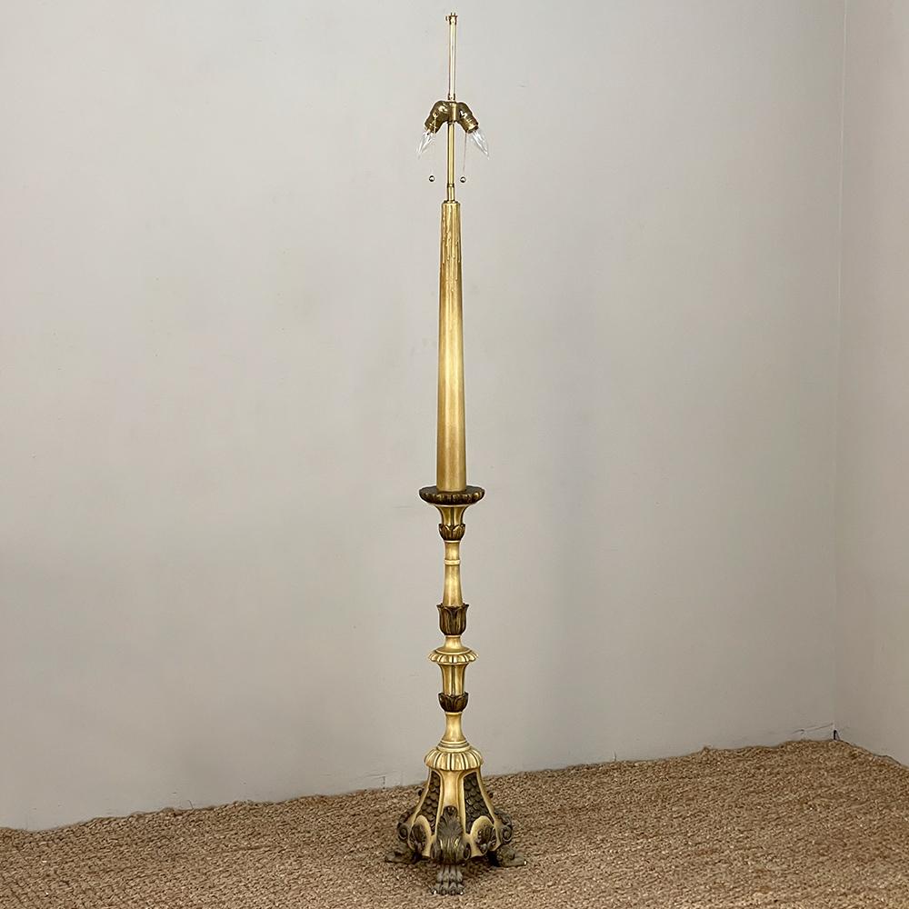 18th century hand-carved & painted Italian candlestick floor lamp is a beautiful example of Italian carvings influenced by Renaissance and Classical designs. The tripod base features four substantial lions' paw feet, connected to a triangular