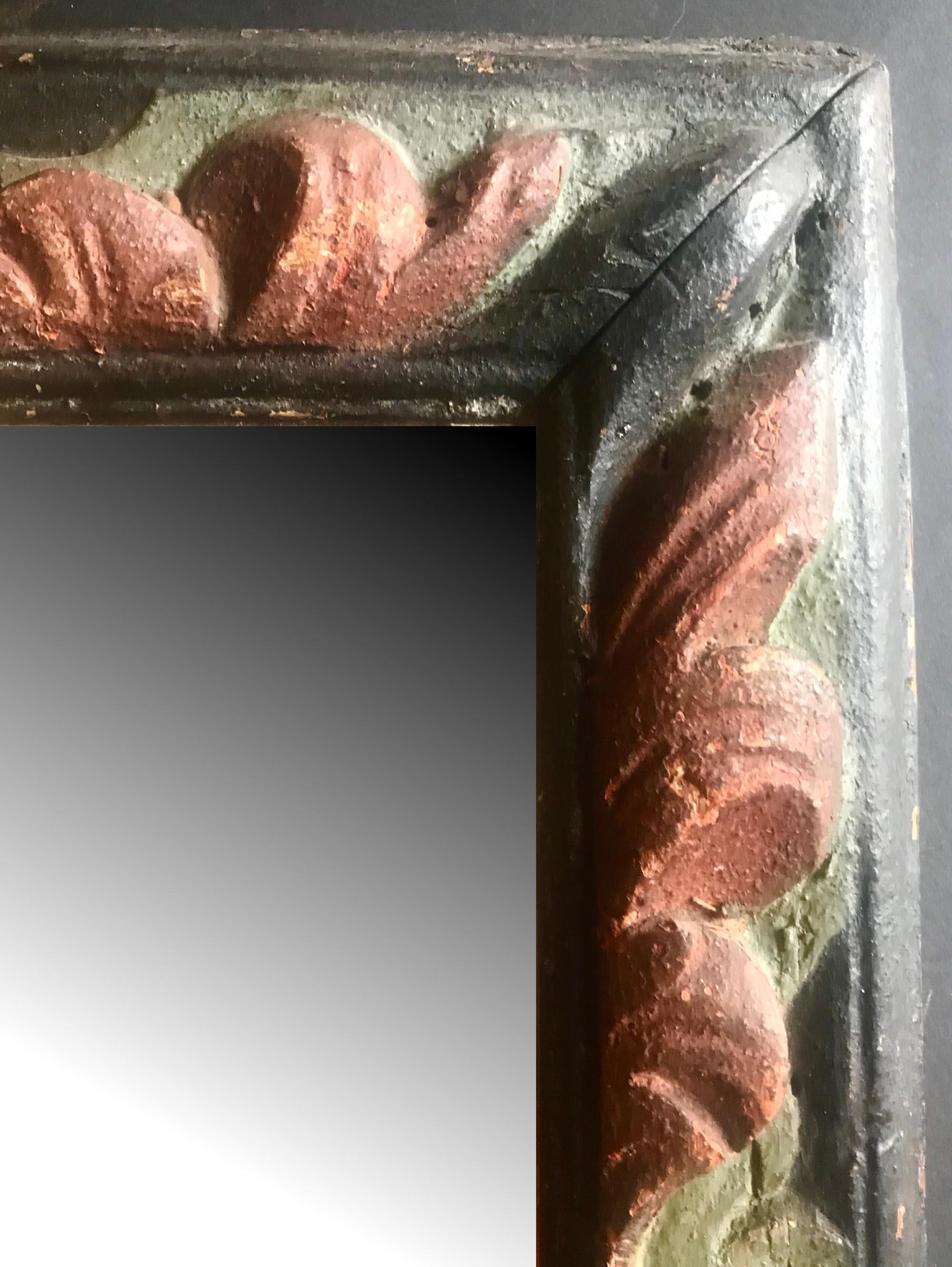 Handgeschnitzter spanischer polychrom bemalter gerahmter Spiegel aus dem 18.

Dieser Barockholzrahmen ist handgeschnitzt und mehrfarbig bemalt. Der Kontrast von Rot und Grün auf dunklem Hintergrund ist dramatisch wirksam und ideal für ein